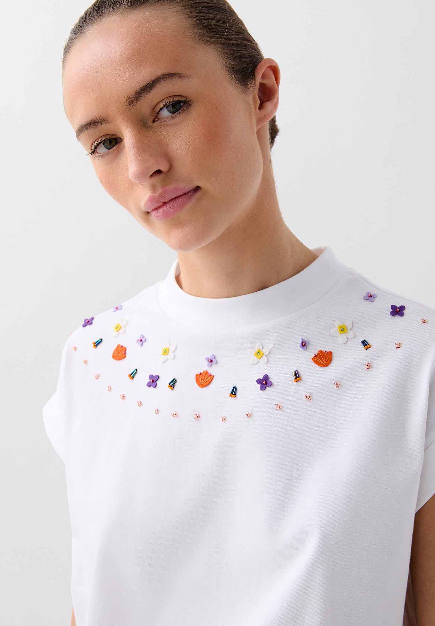 CROP TOP WITH EMBROIDERED DETAILS