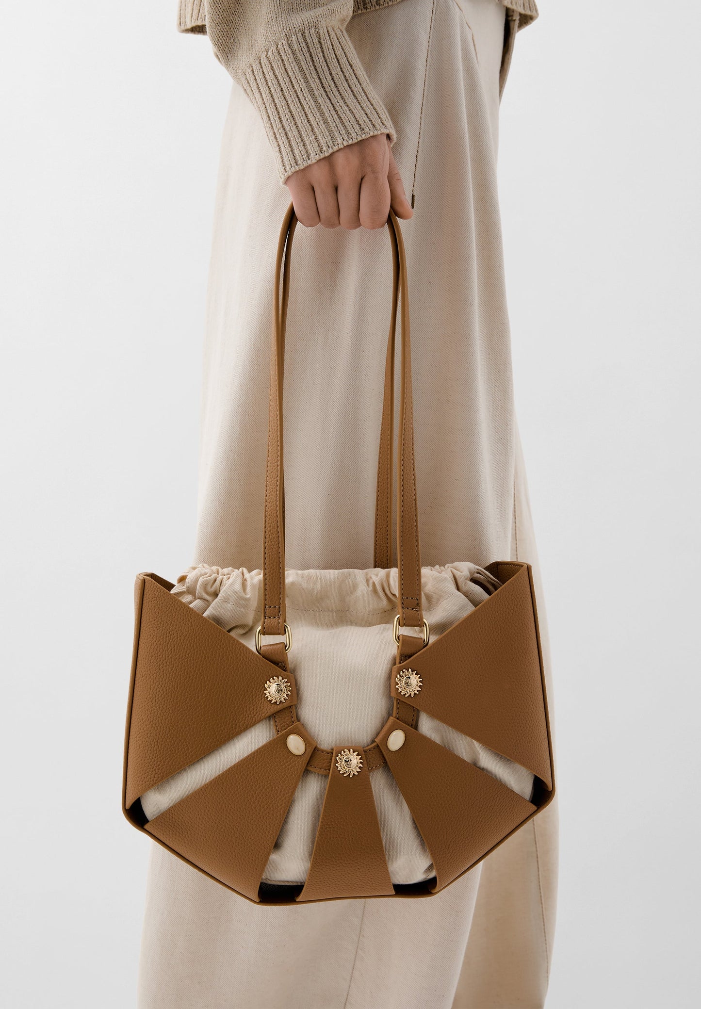 BUCKET BAG WITH SUN DETAILS