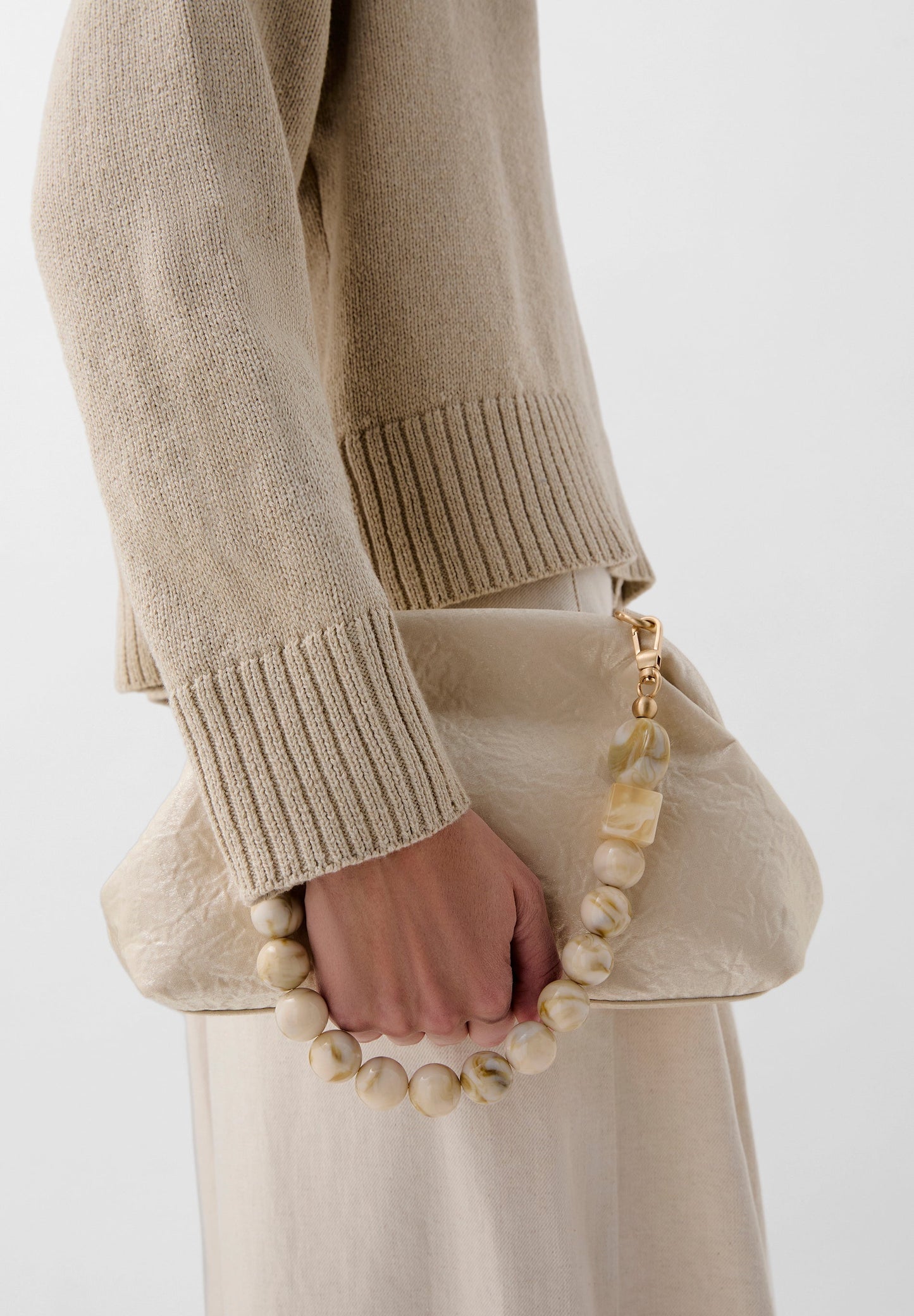 IRIDESCENT CLUTCH WITH BEADED HANDLE