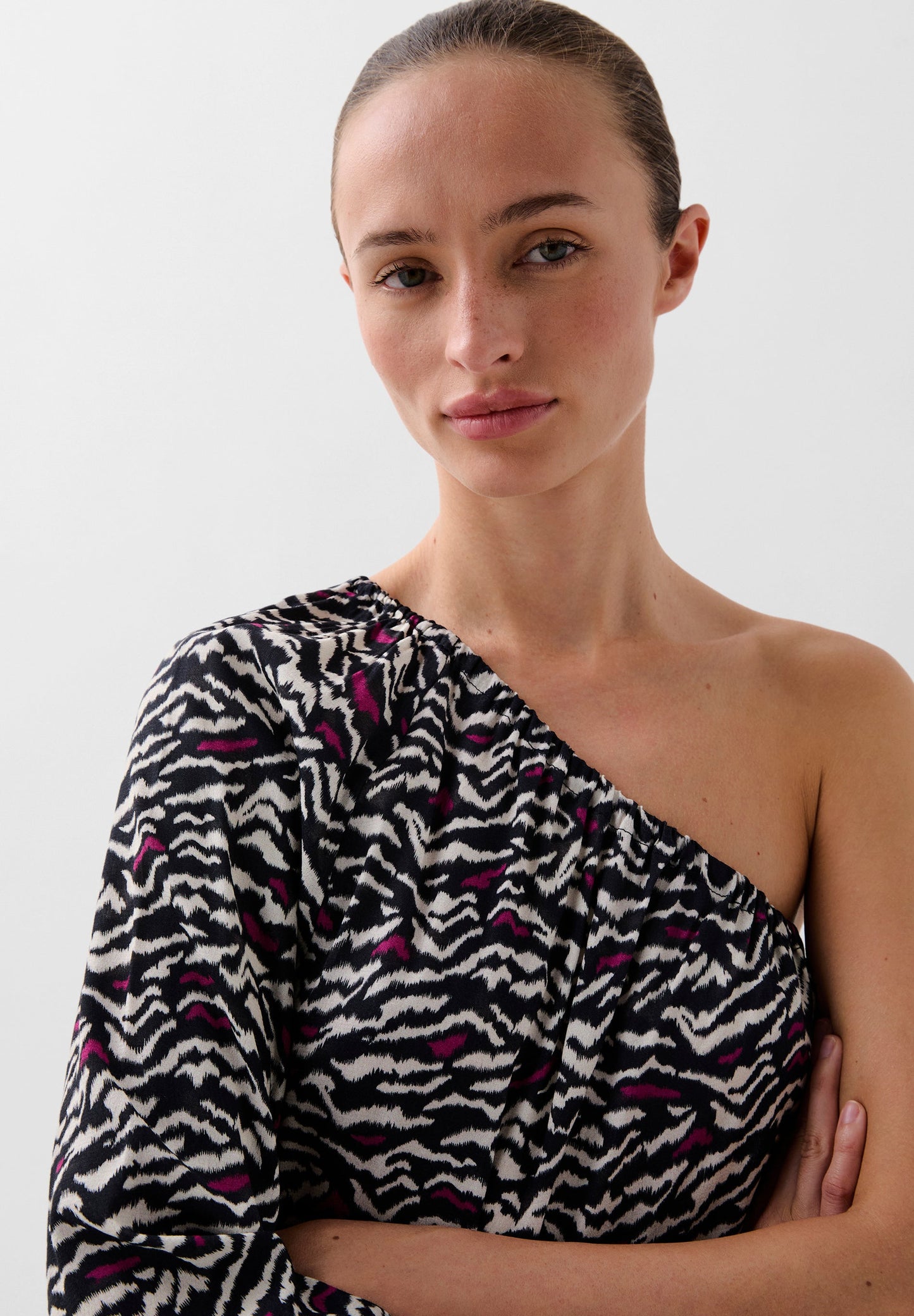ASYMMETRIC ANIMAL PRINT BLOUSE