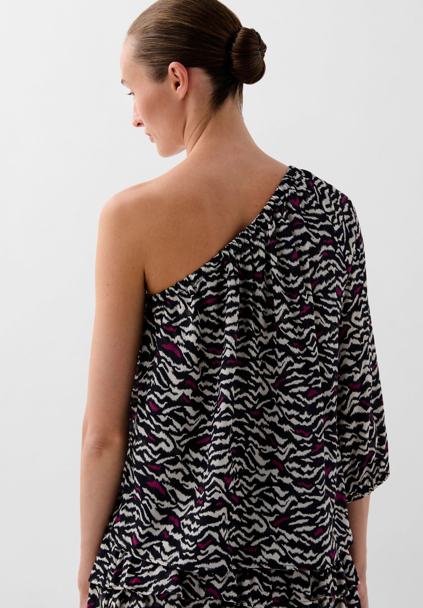ASYMMETRIC ANIMAL PRINT BLOUSE