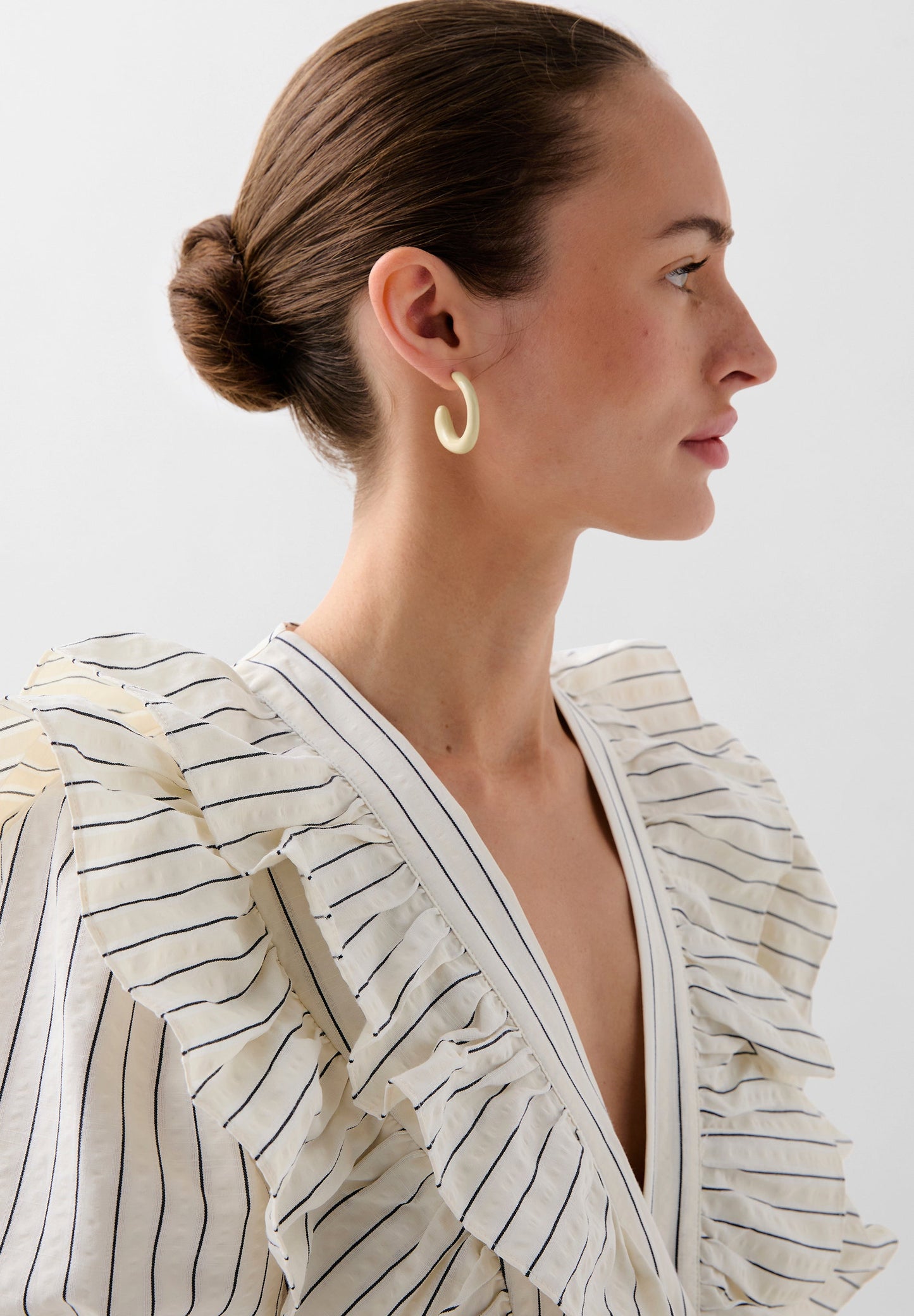 STRIPED JUMPSUIT WITH RUFFLES