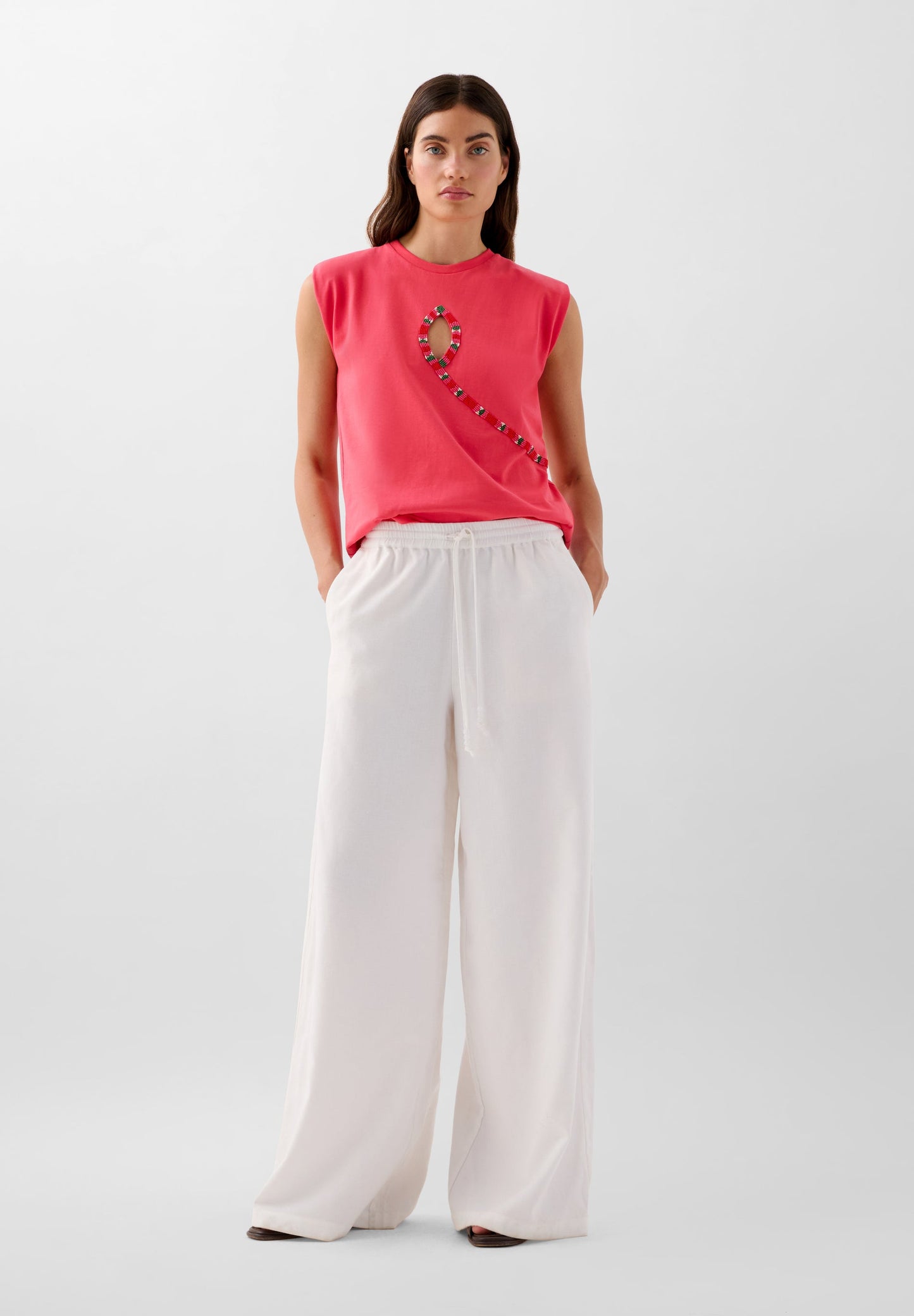 T-SHIRT WITH BEADED OPENING DETAIL