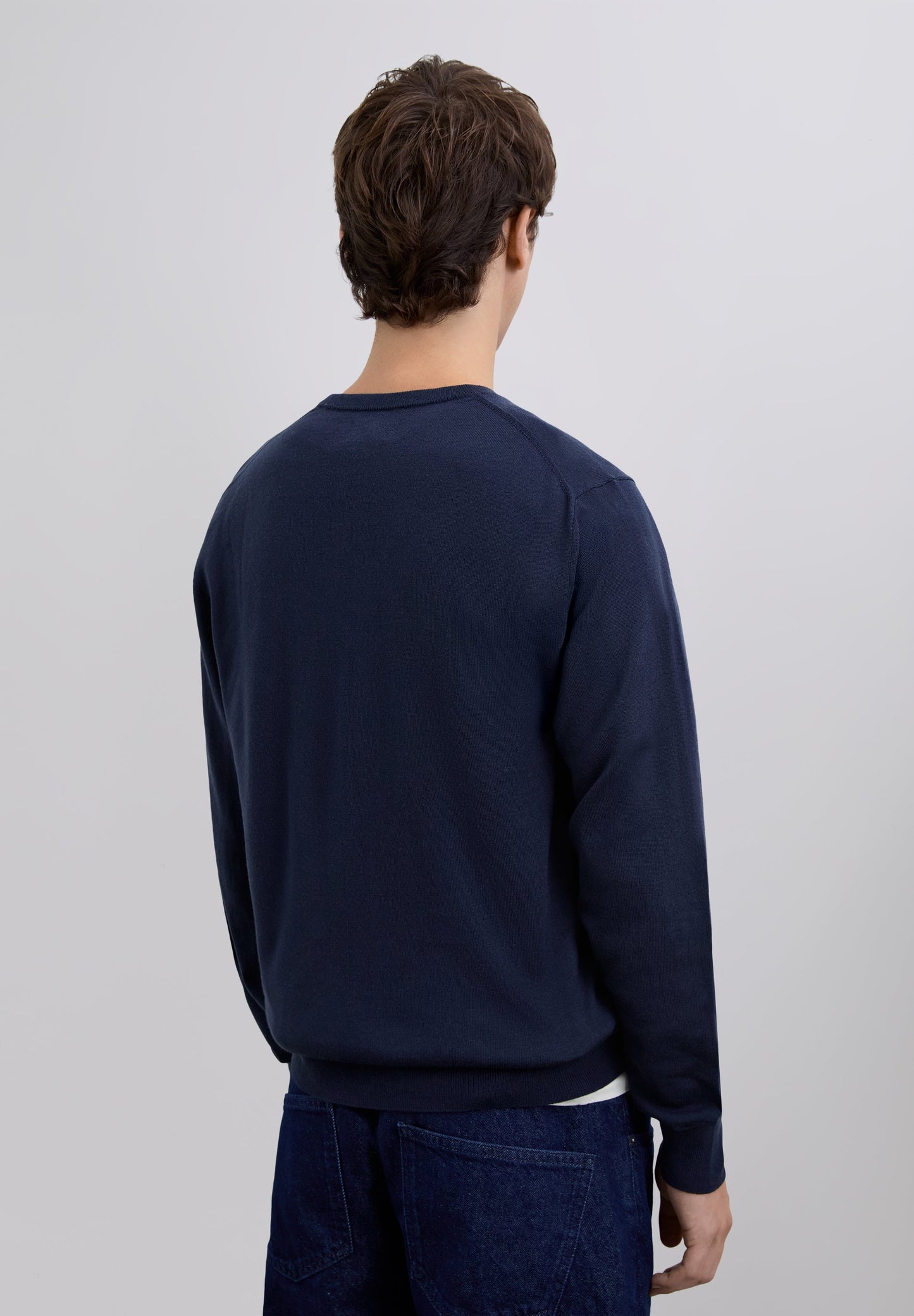 WOOL SWEATER WITH EMBROIDERED SKULL