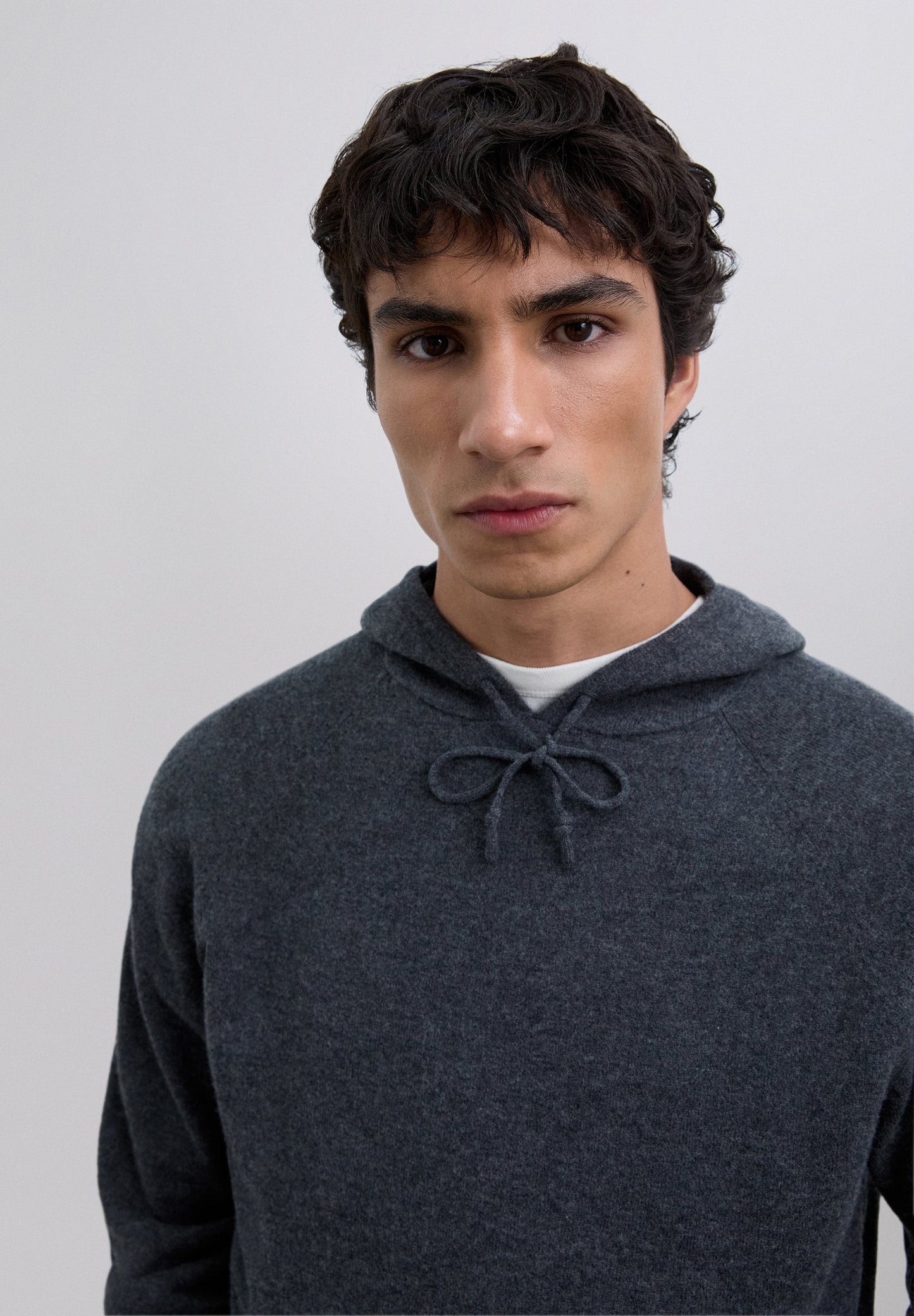 WOOL SWEATER WITH ADJUSTABLE HOOD