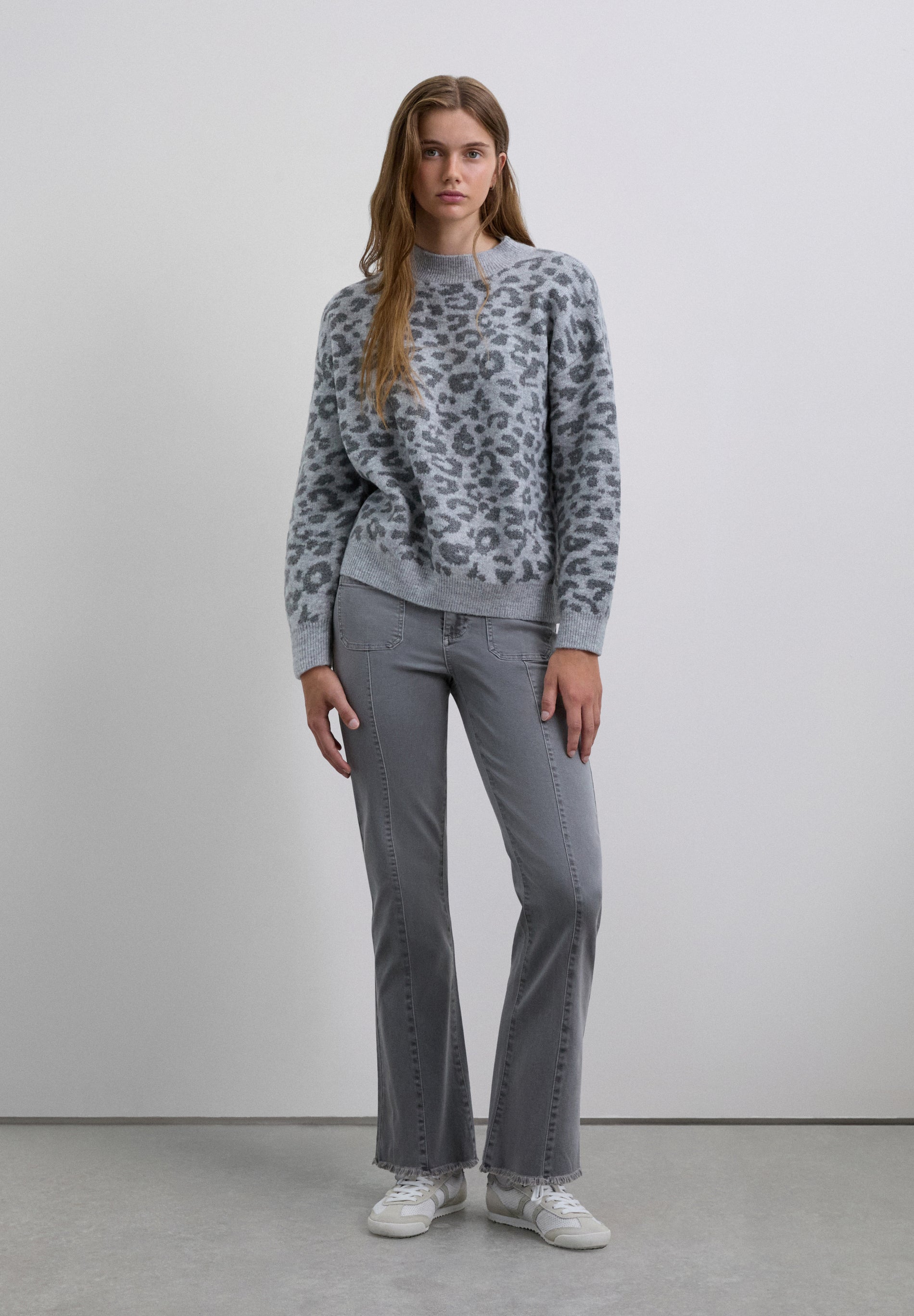 FLARED TROUSERS WITH FRINGING