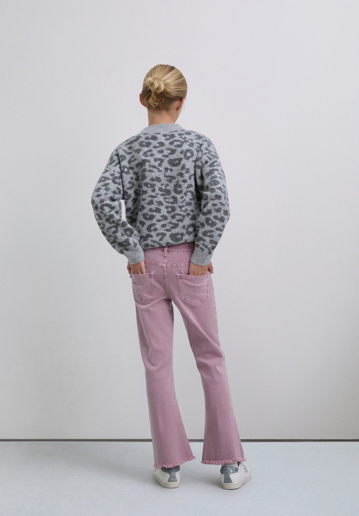 FLARED TROUSERS WITH FRINGING