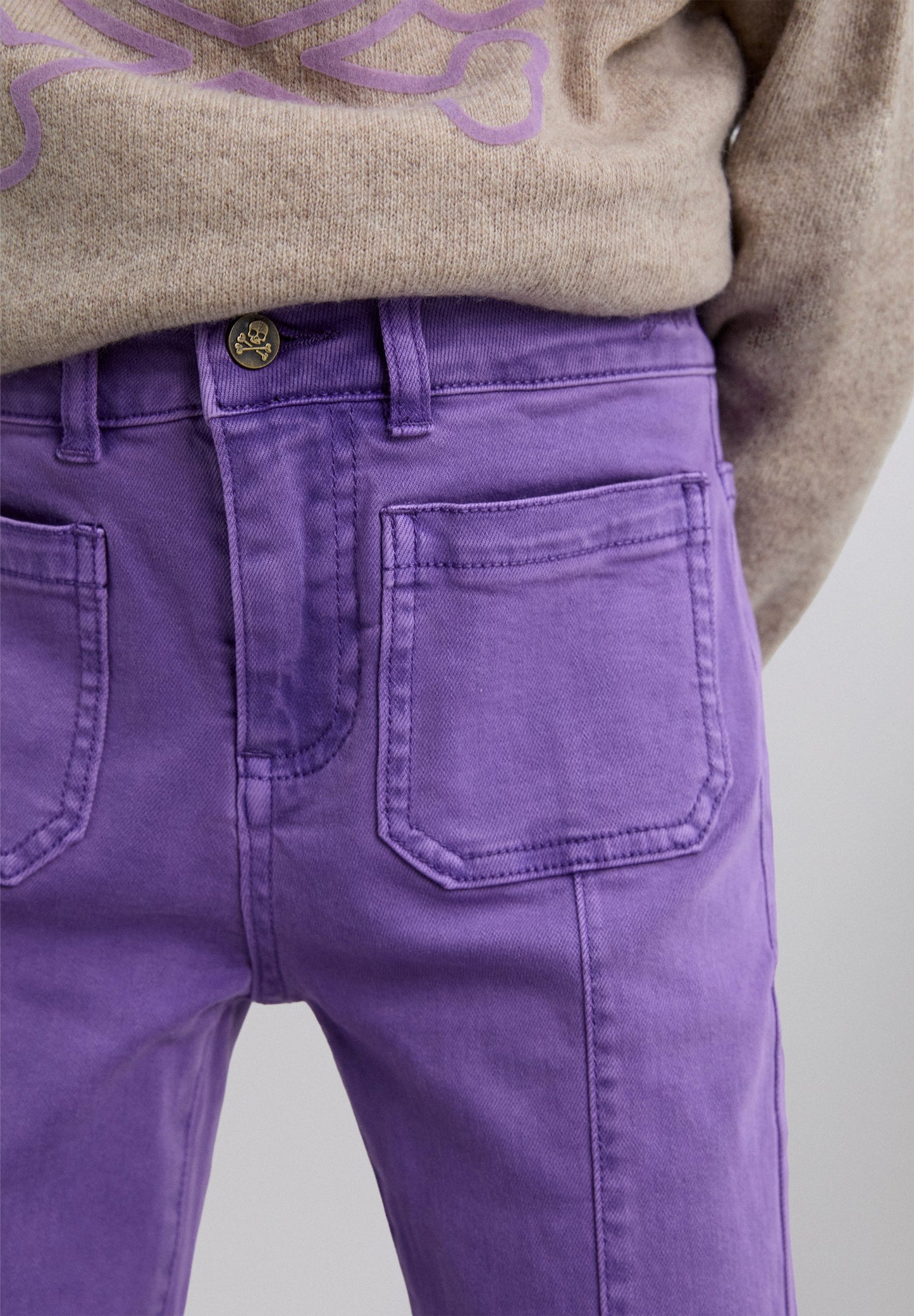 FLARED TROUSERS WITH FRINGING