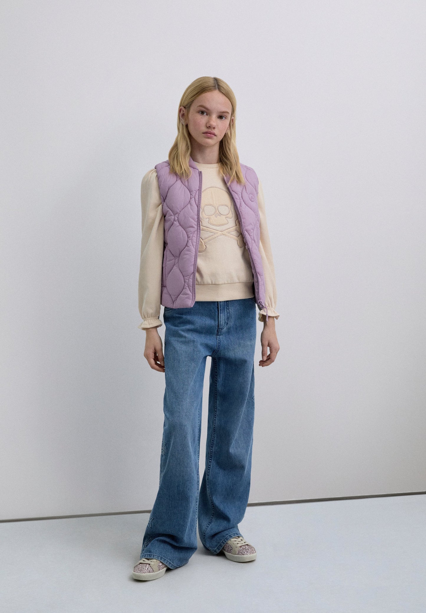 PUFFER VEST WITH SKULL