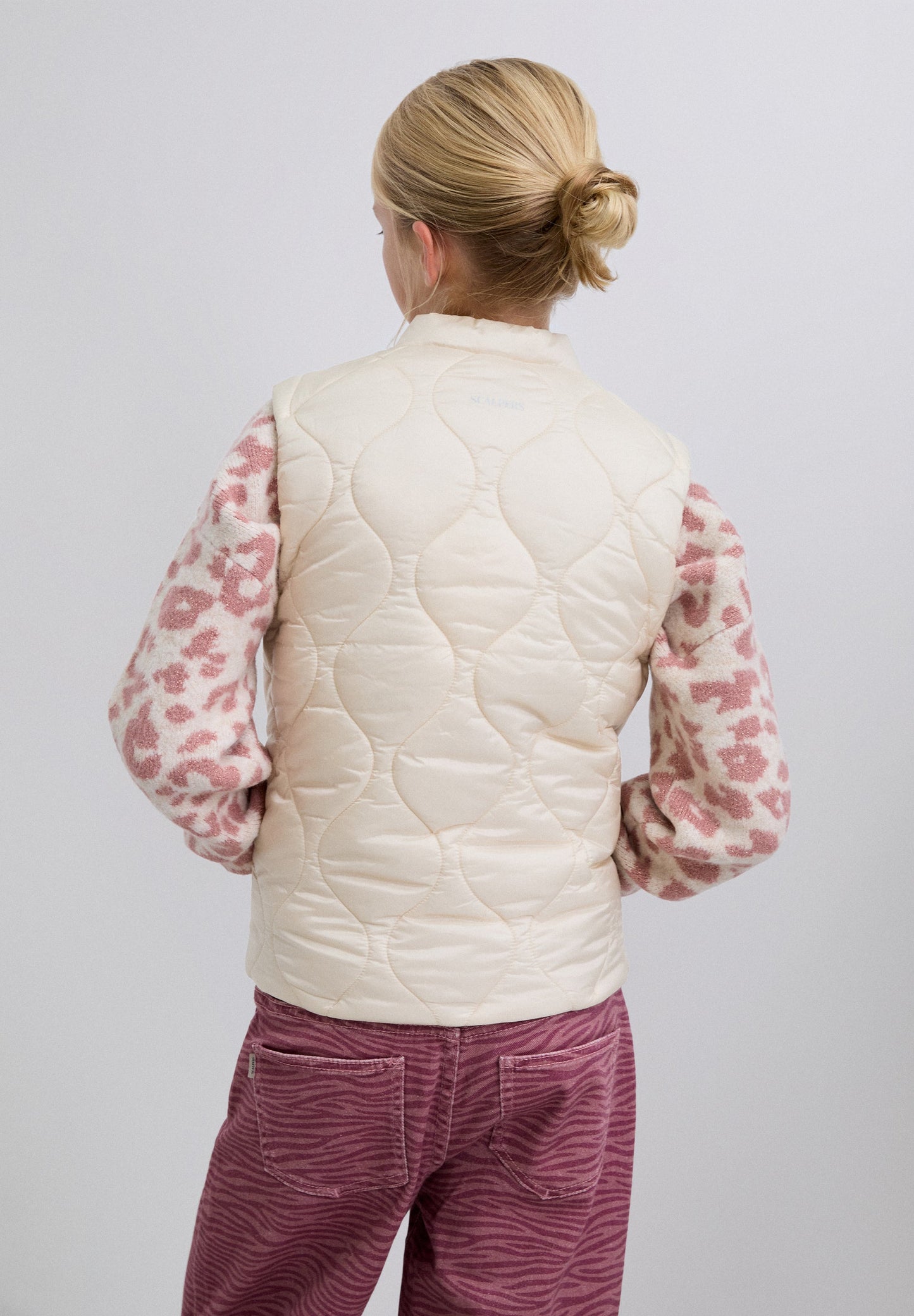 PUFFER VEST WITH SKULL