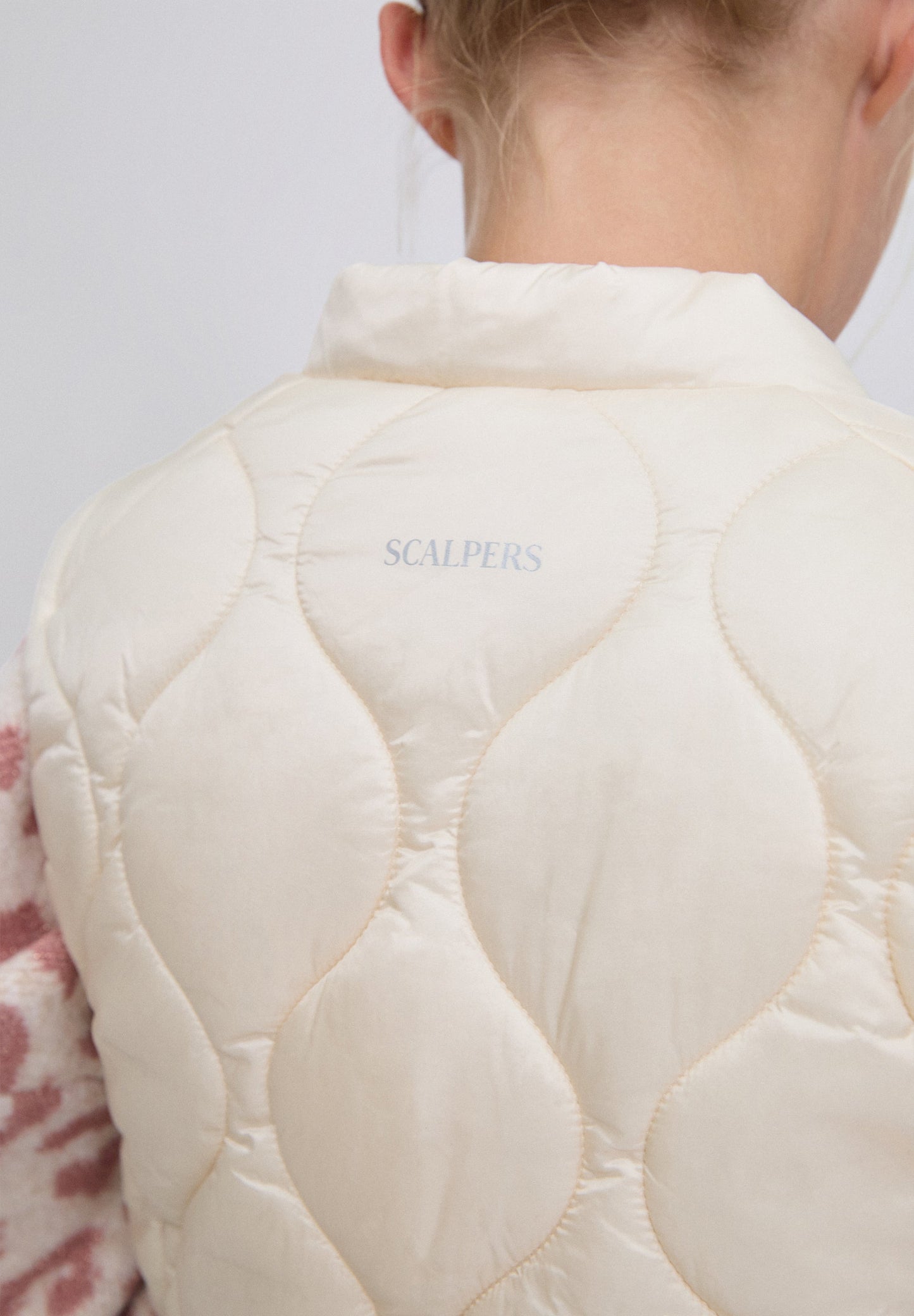 PUFFER VEST WITH SKULL