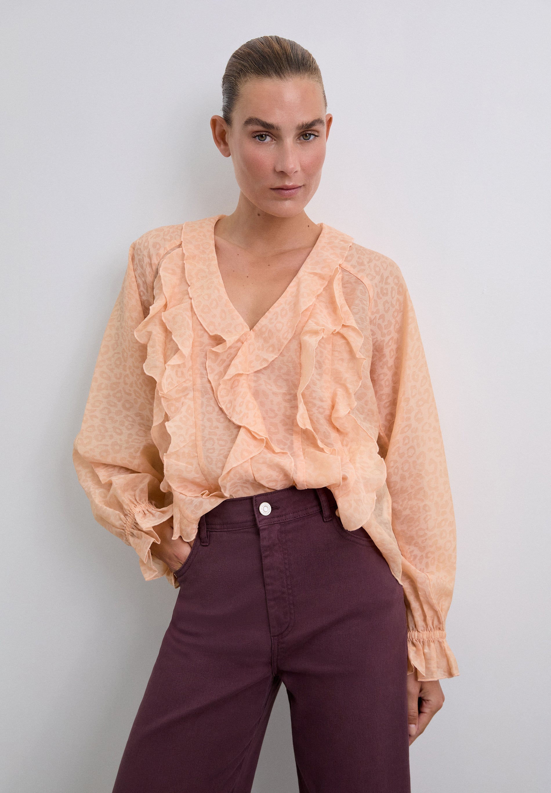 ANIMAL PRINT BLOUSE WITH RUFFLES