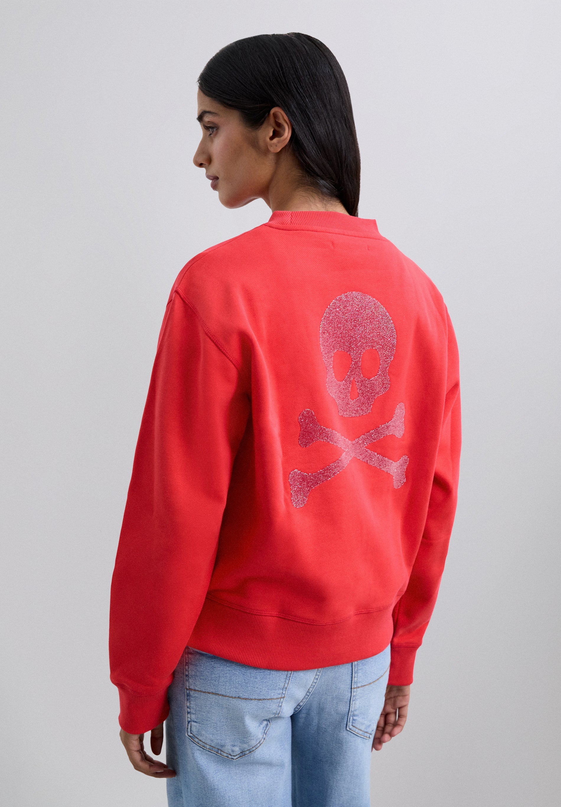 SWEATSHIRT WITH GLITTER SKULL ON THE BACK