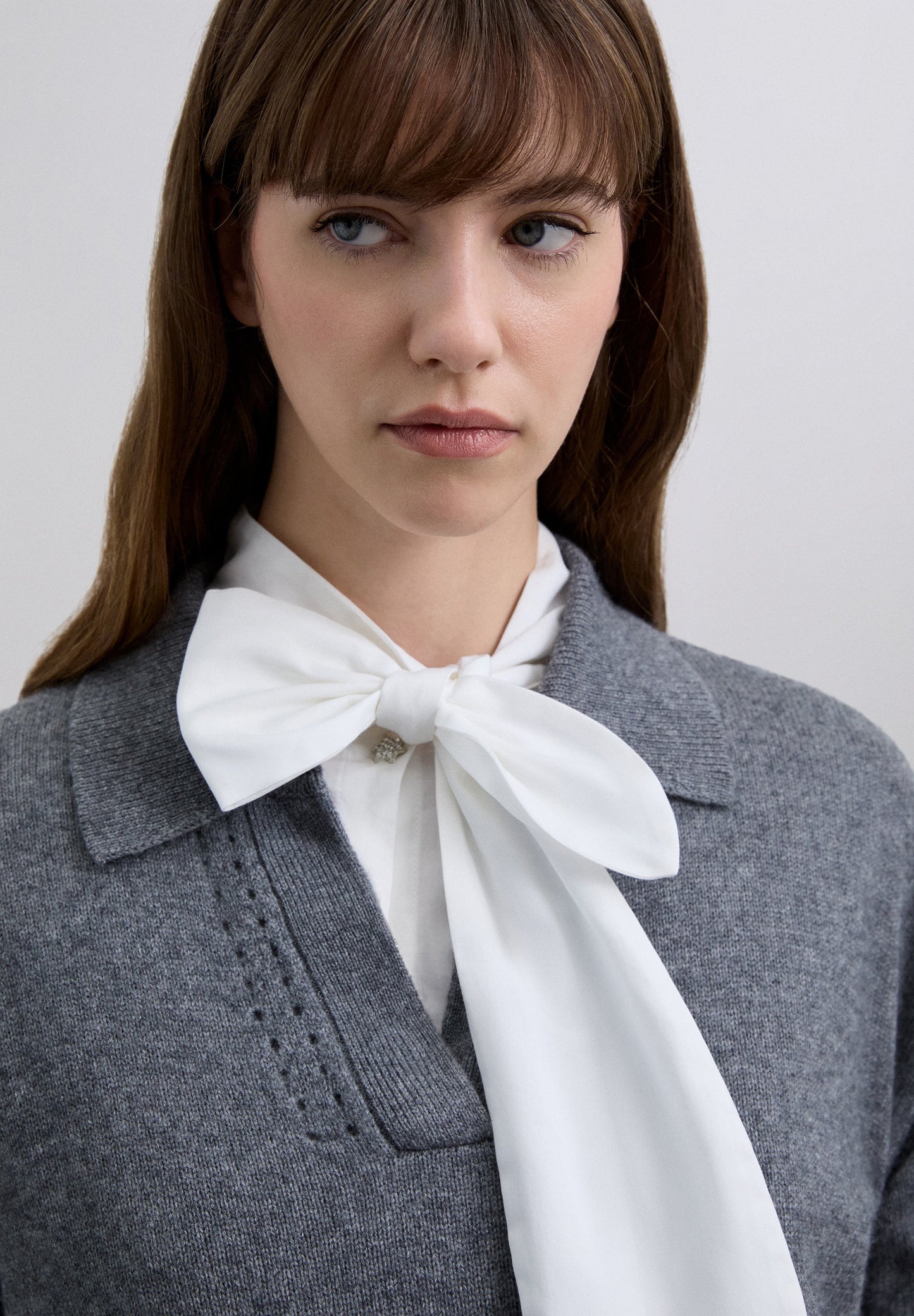 POLO JUMPER WITH EMBOSSED DETAILS