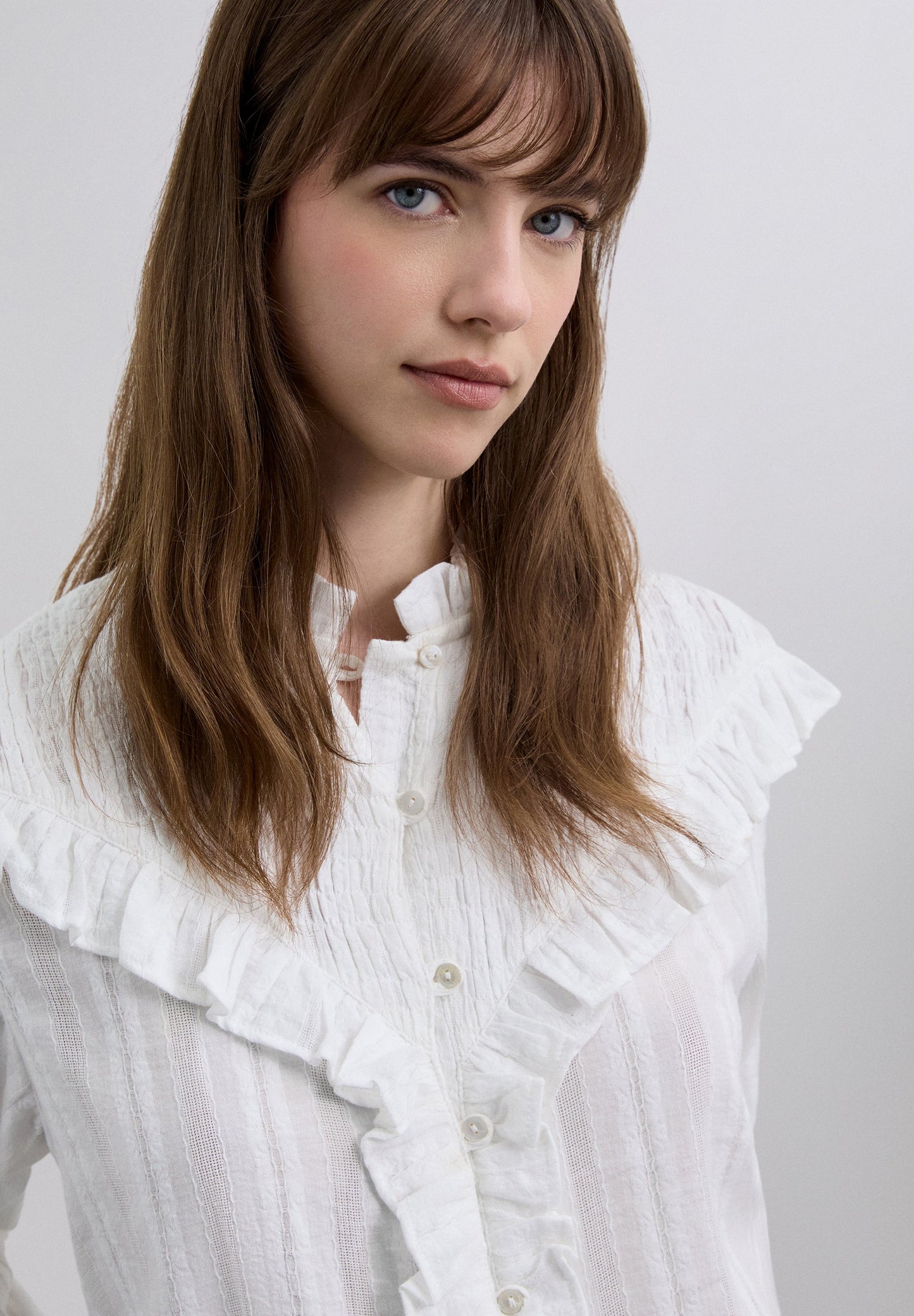 RUCHED BLOUSE WITH RUFFLES.