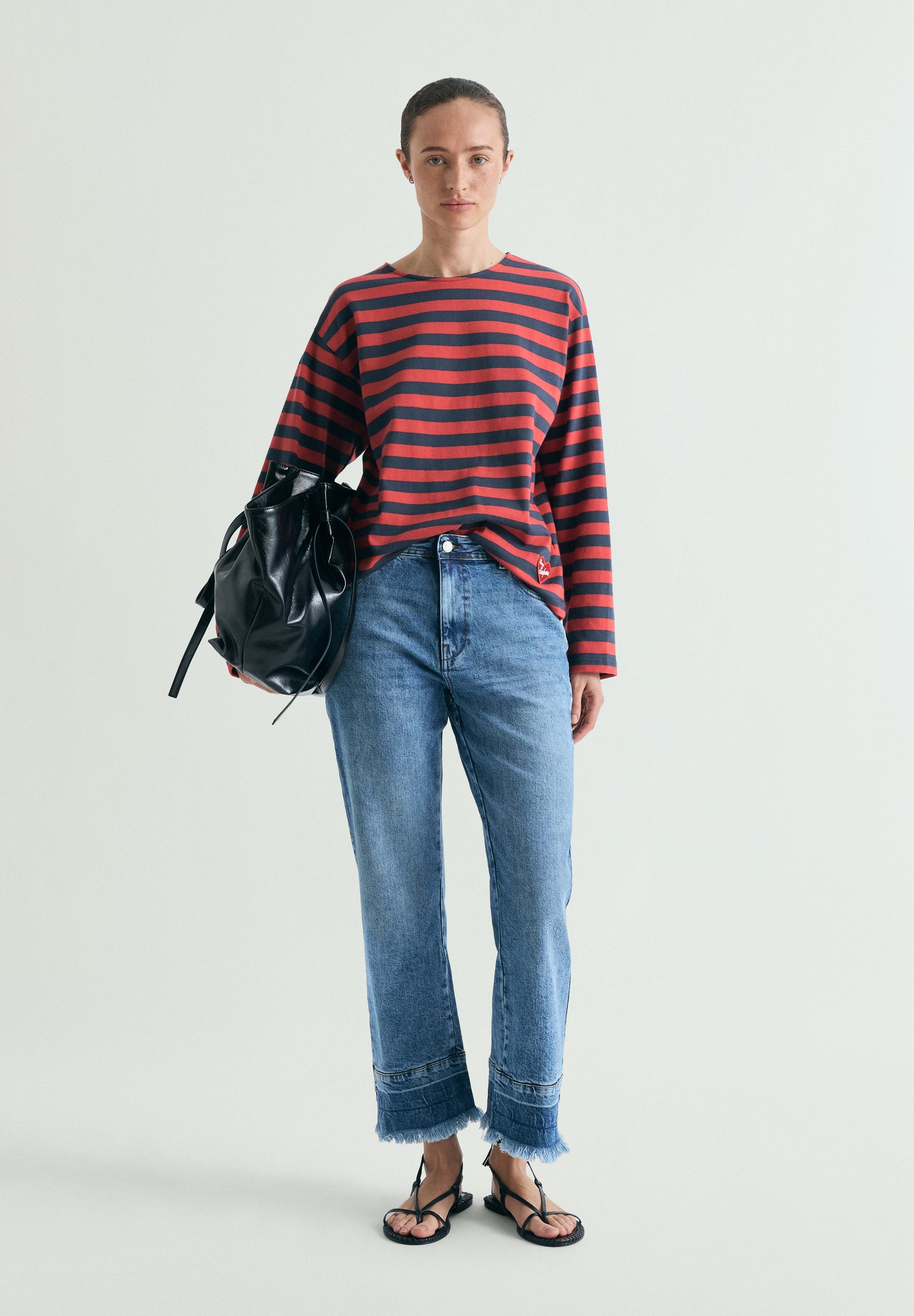 FADED FRAYED EDGE JEANS