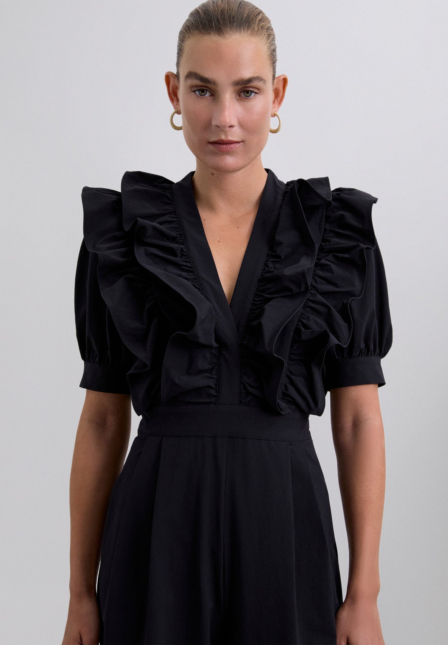 BLACK JUMPSUIT WITH RUFFLES