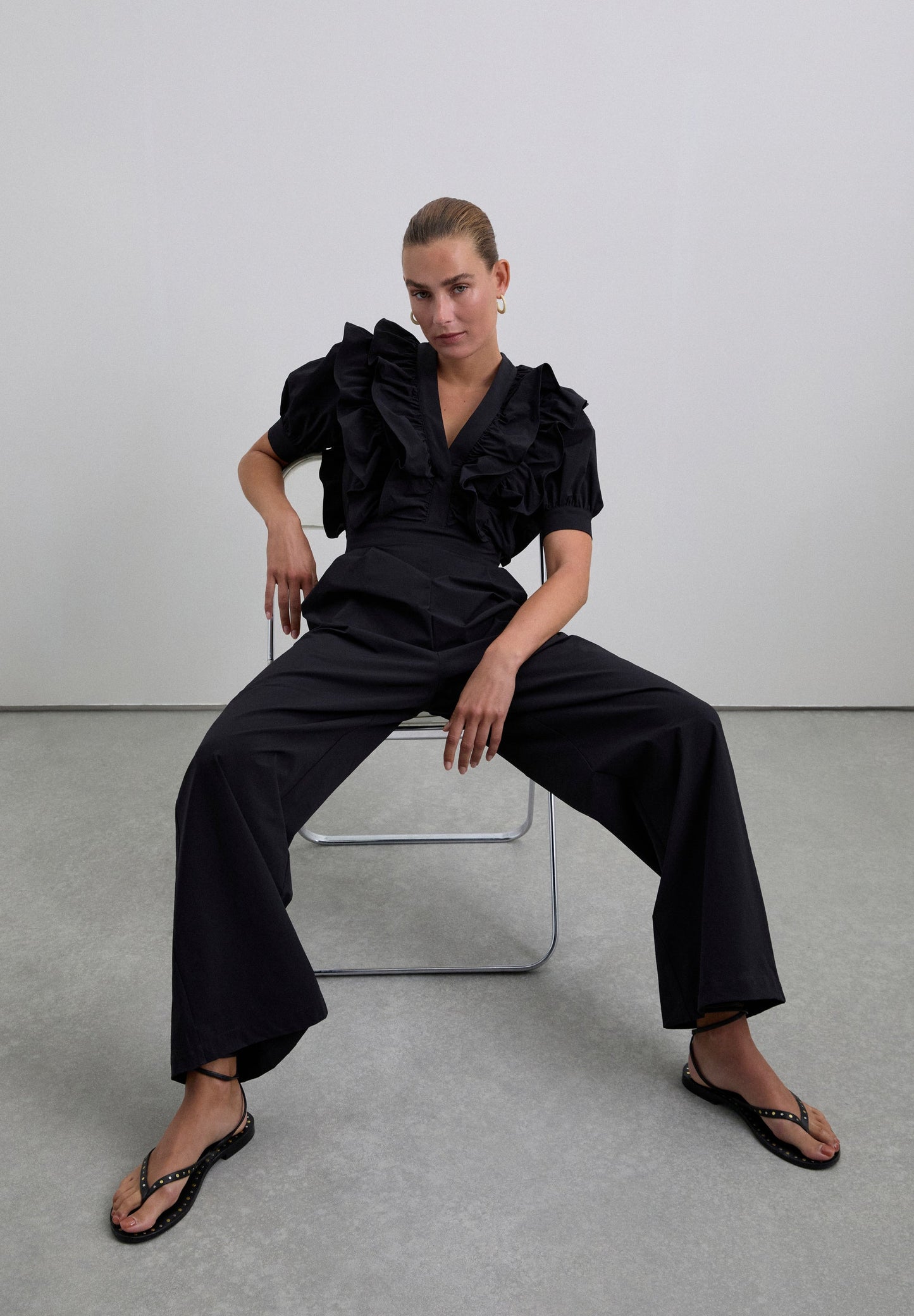 BLACK JUMPSUIT WITH RUFFLES