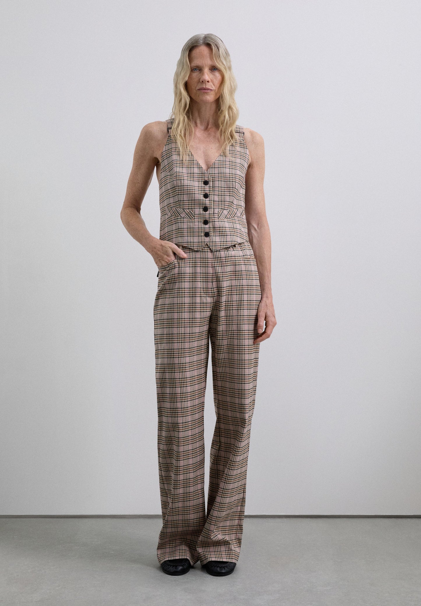 CHECKED FLARED TROUSERS