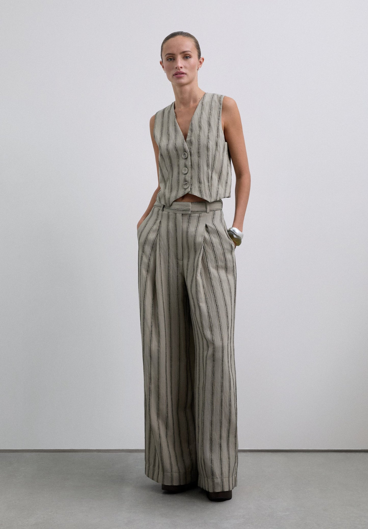 STRIPED WAISTCOAT WITH METALLIC DETAILS