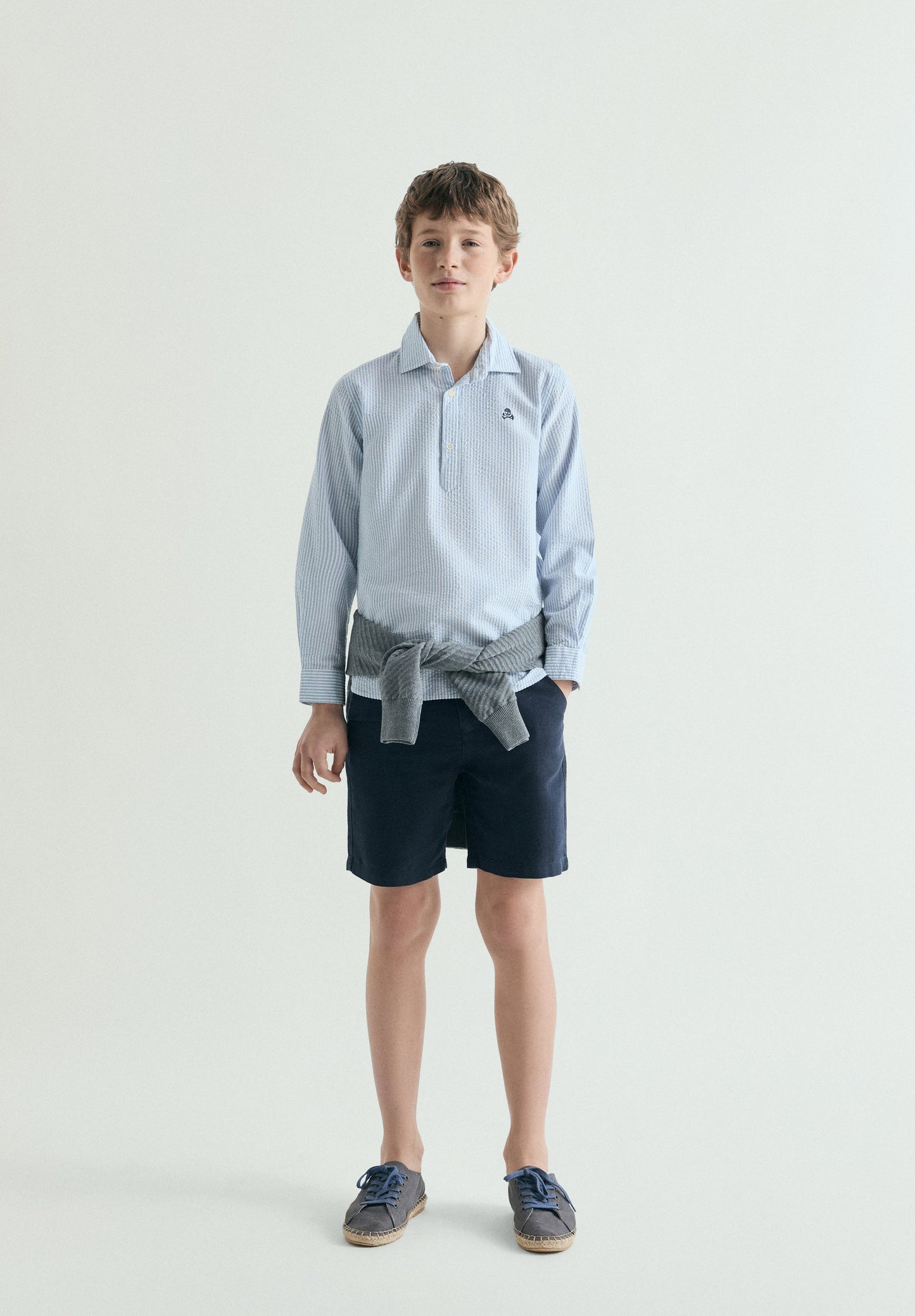 STRIPED POLO SHIRT WITH SKULL