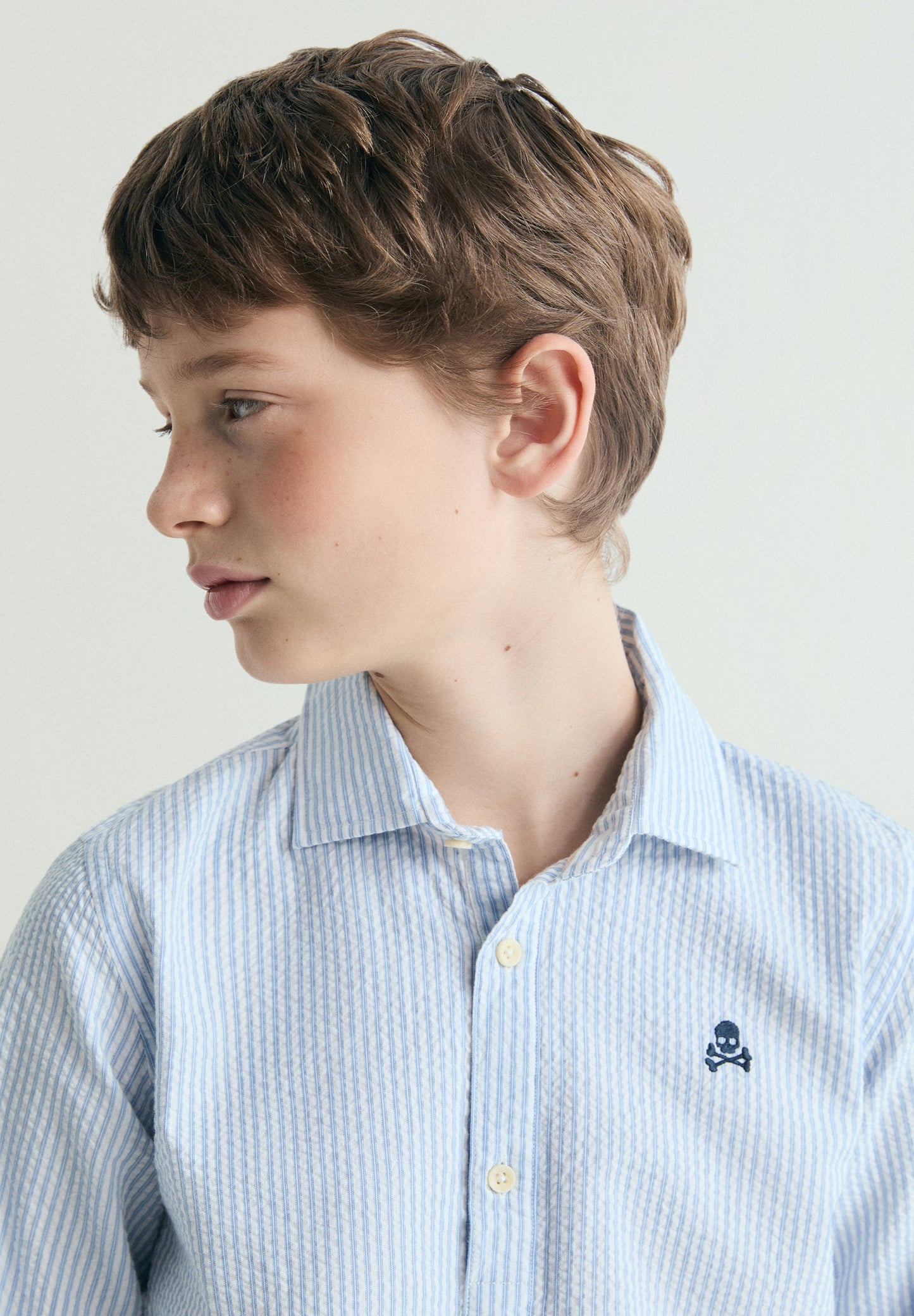 STRIPED POLO SHIRT WITH SKULL