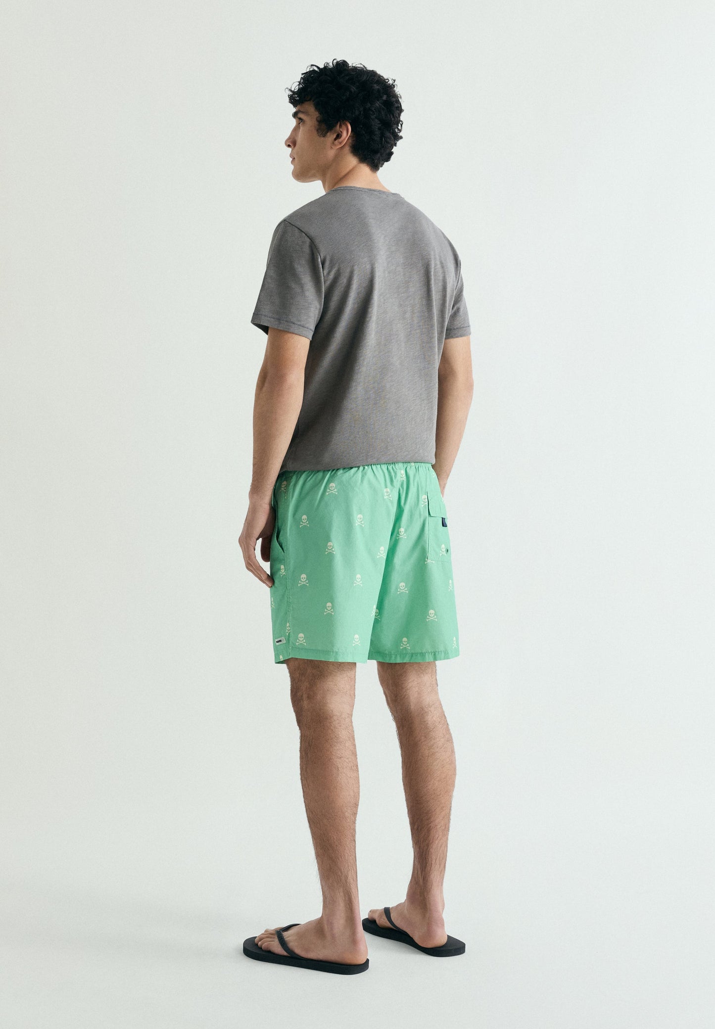 CONTRAST SKULL SWIMMING TRUNKS