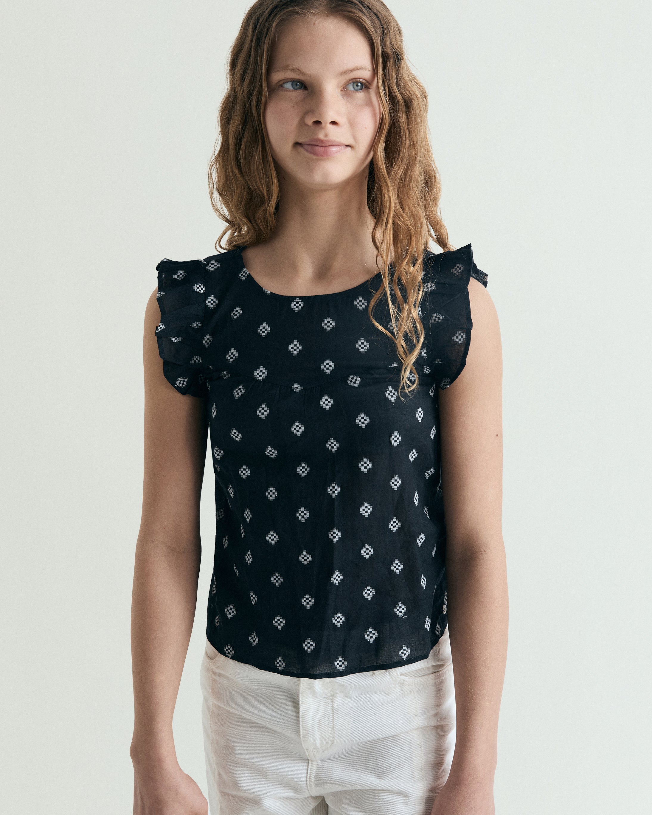 SLEEVELESS JACQUARD BLOUSE