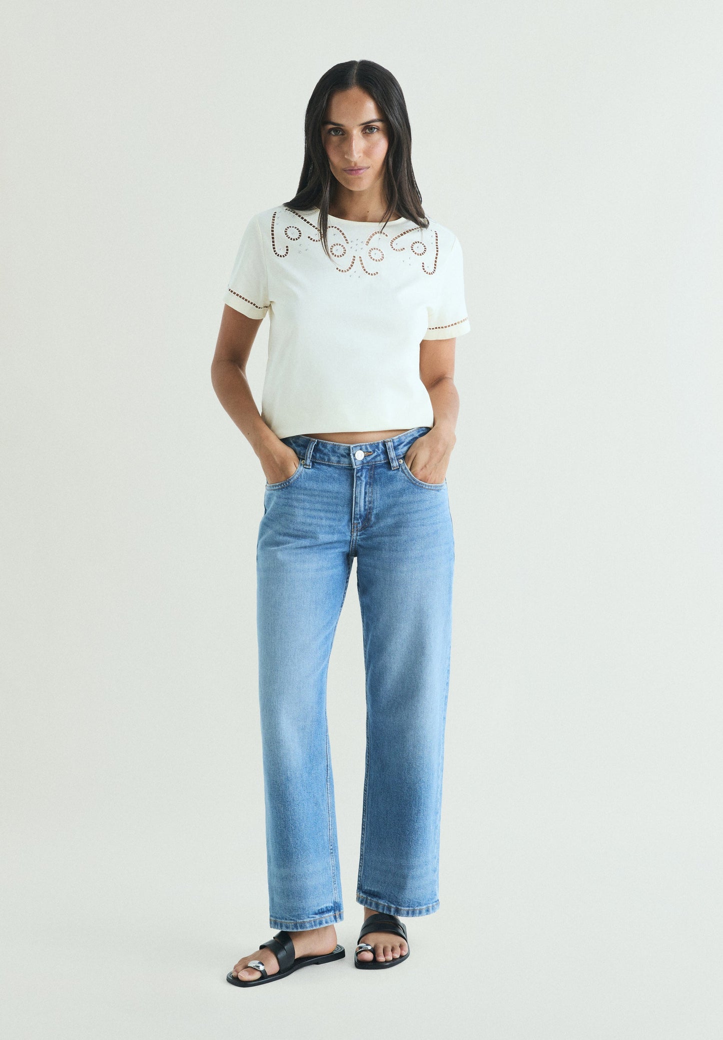 T-SHIRT WITH DIE-CUT STUDDED DETAILS
