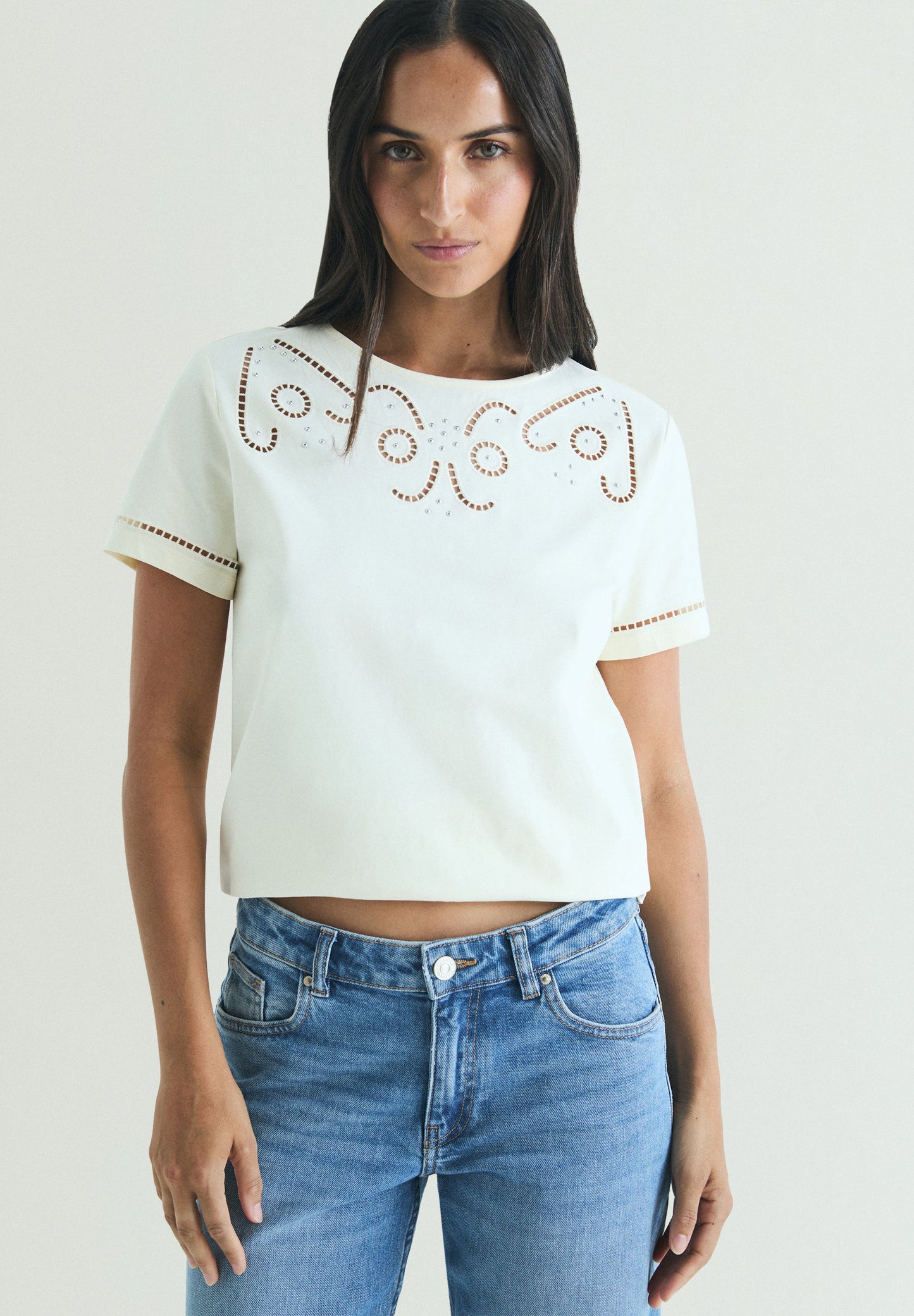 T-SHIRT WITH DIE-CUT STUDDED DETAILS