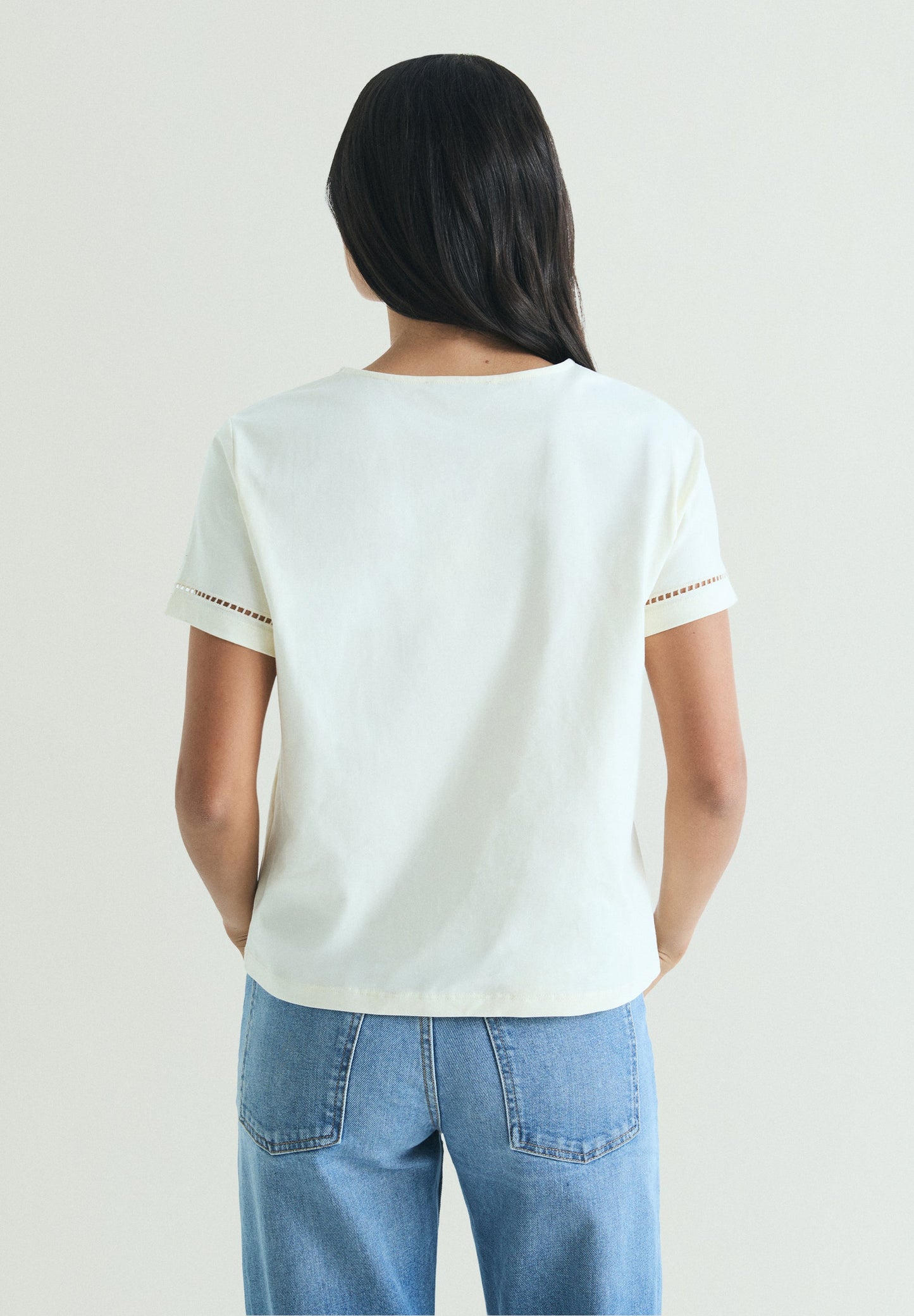 T-SHIRT WITH DIE-CUT STUDDED DETAILS