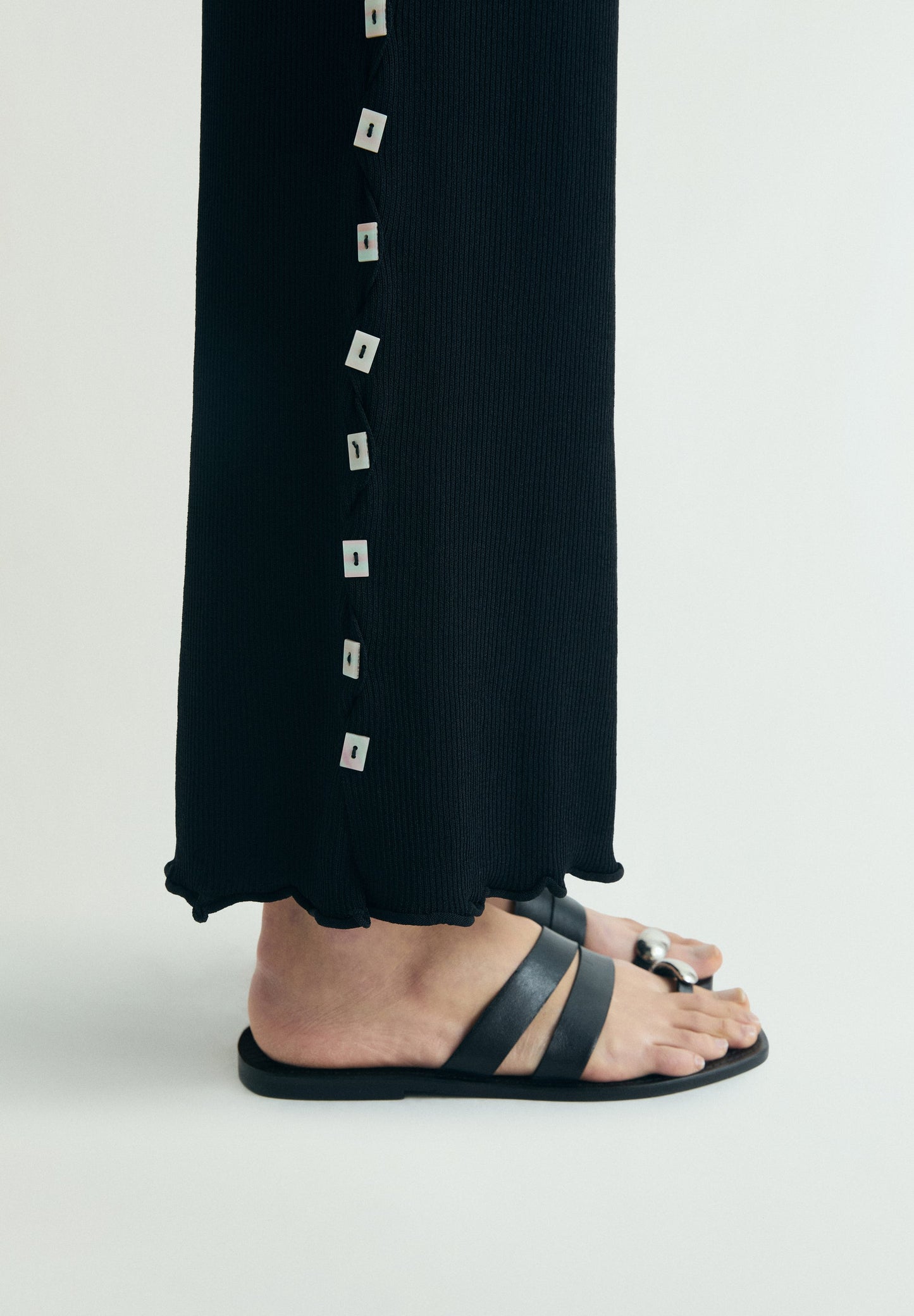 KNIT TROUSERS WITH SIDE APPLIQUÉS