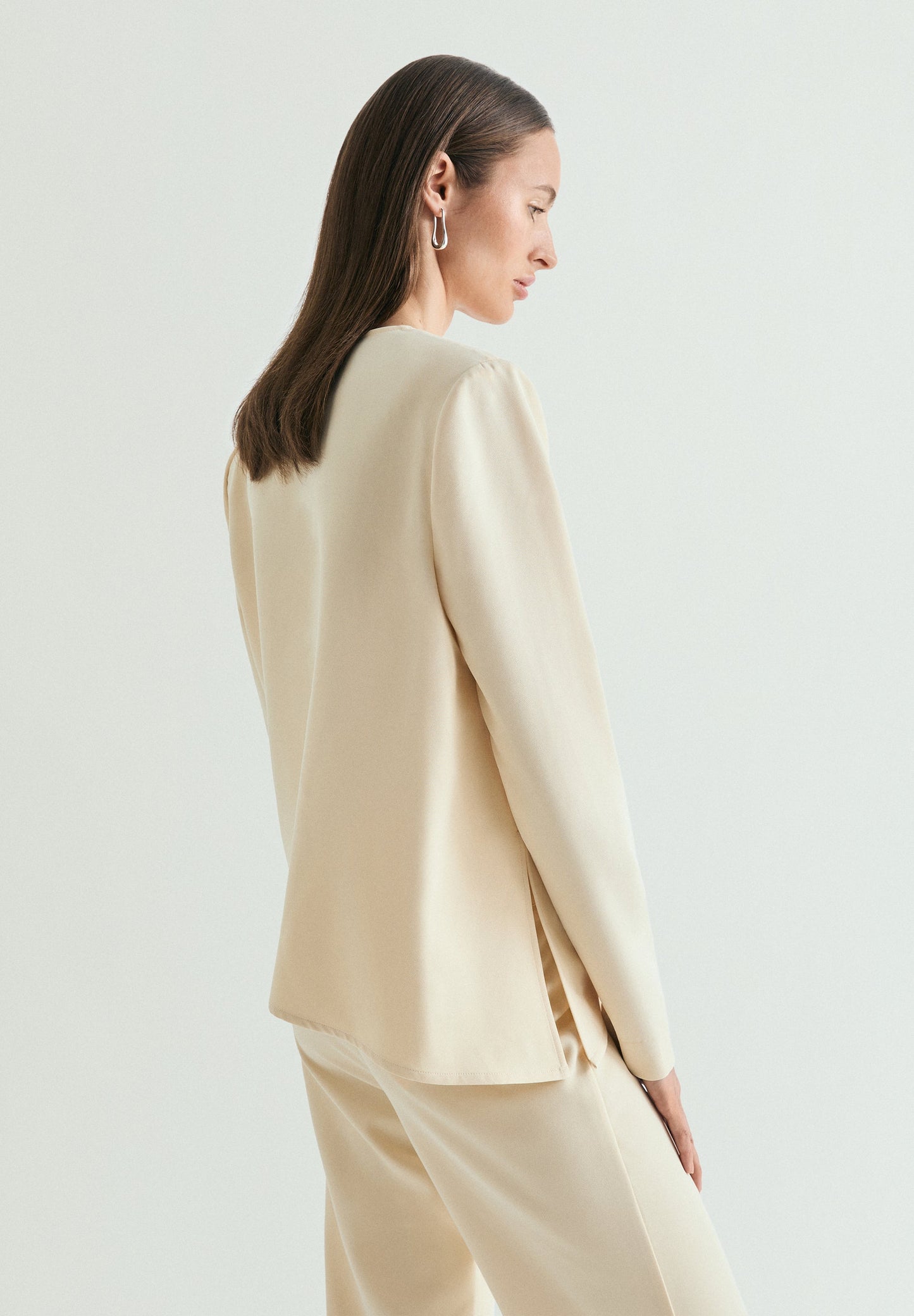 FLOWING ASYMMETRIC TOP