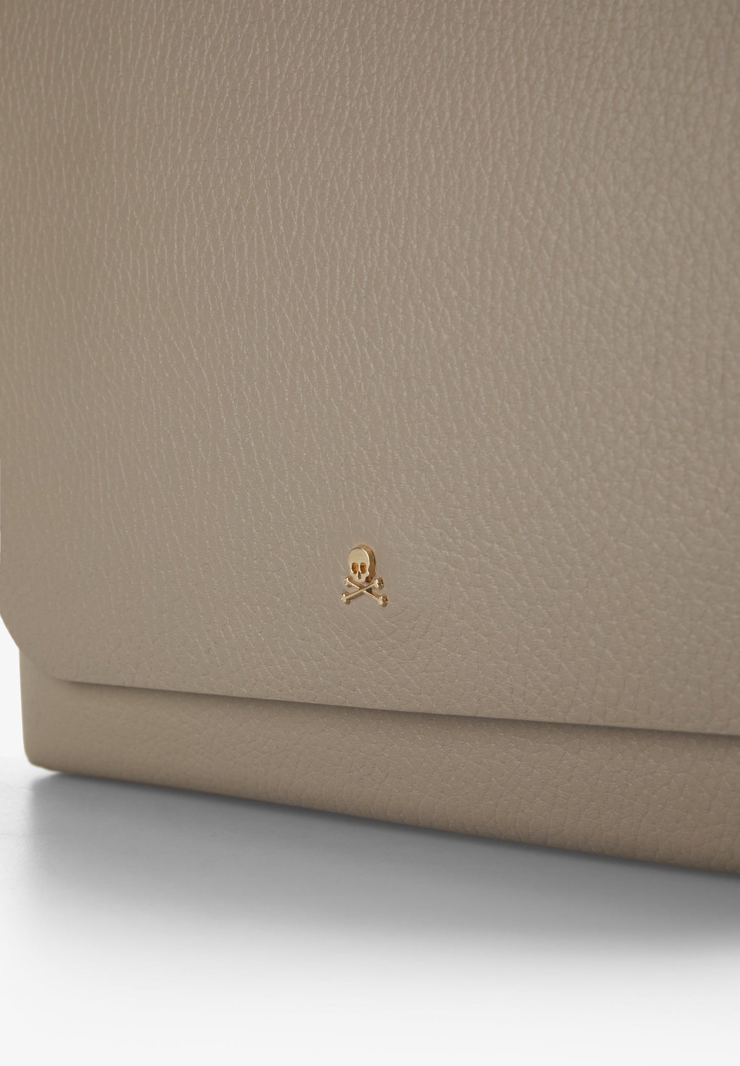 LEATHER BAG WITH APPLIQUÉS