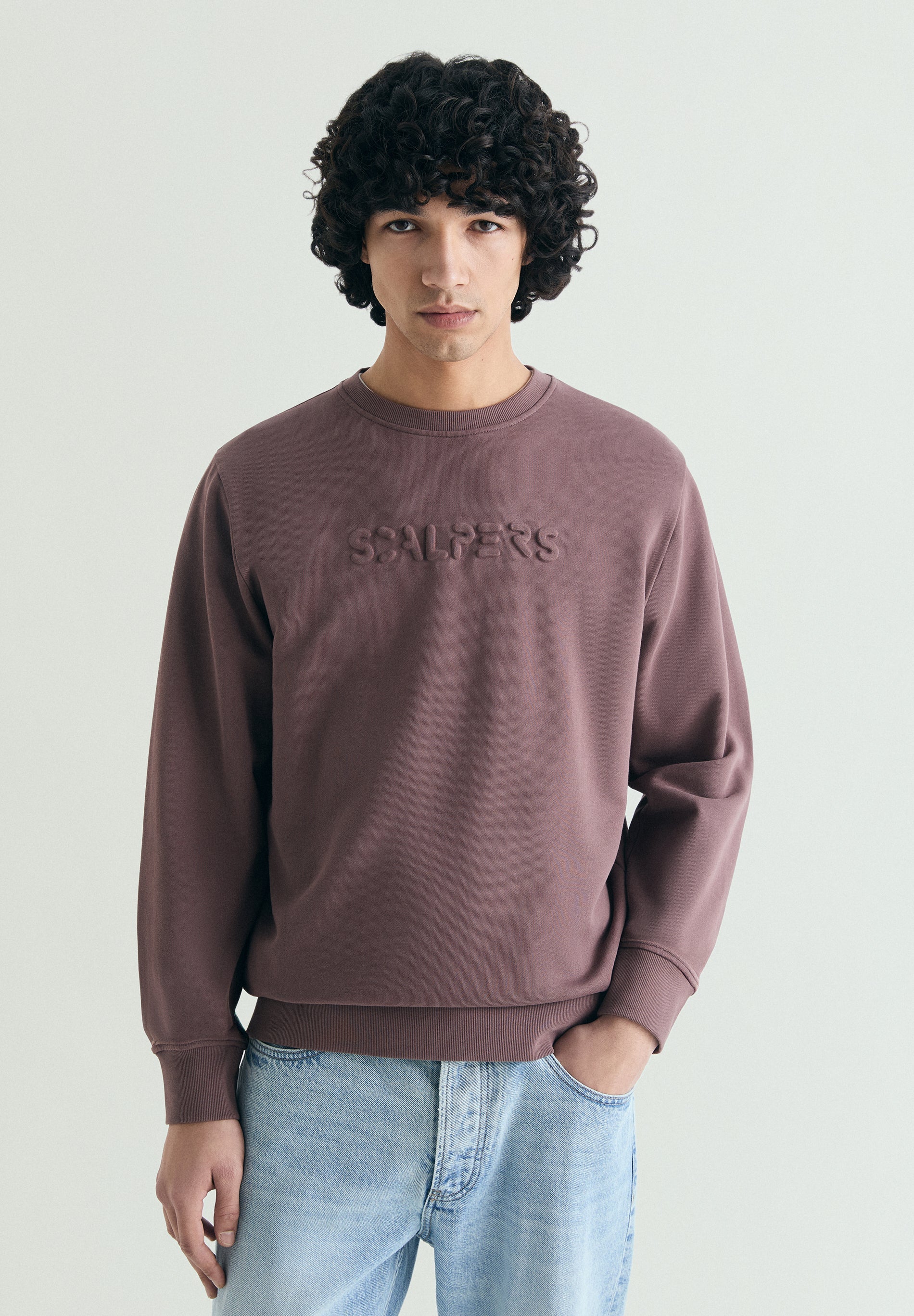 SWEATSHIRT WITH EMBOSSED SKULL