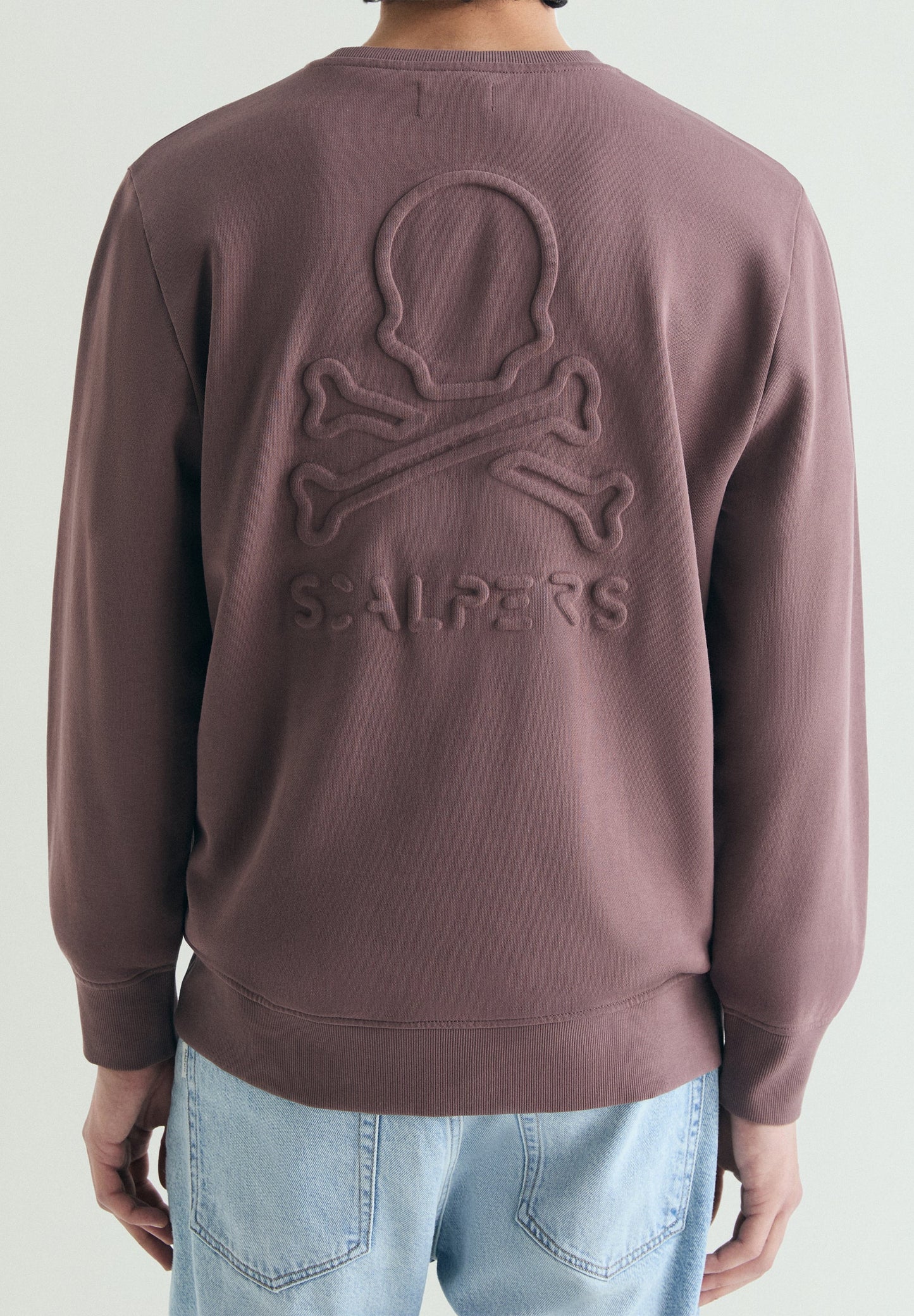 SWEATSHIRT WITH EMBOSSED SKULL