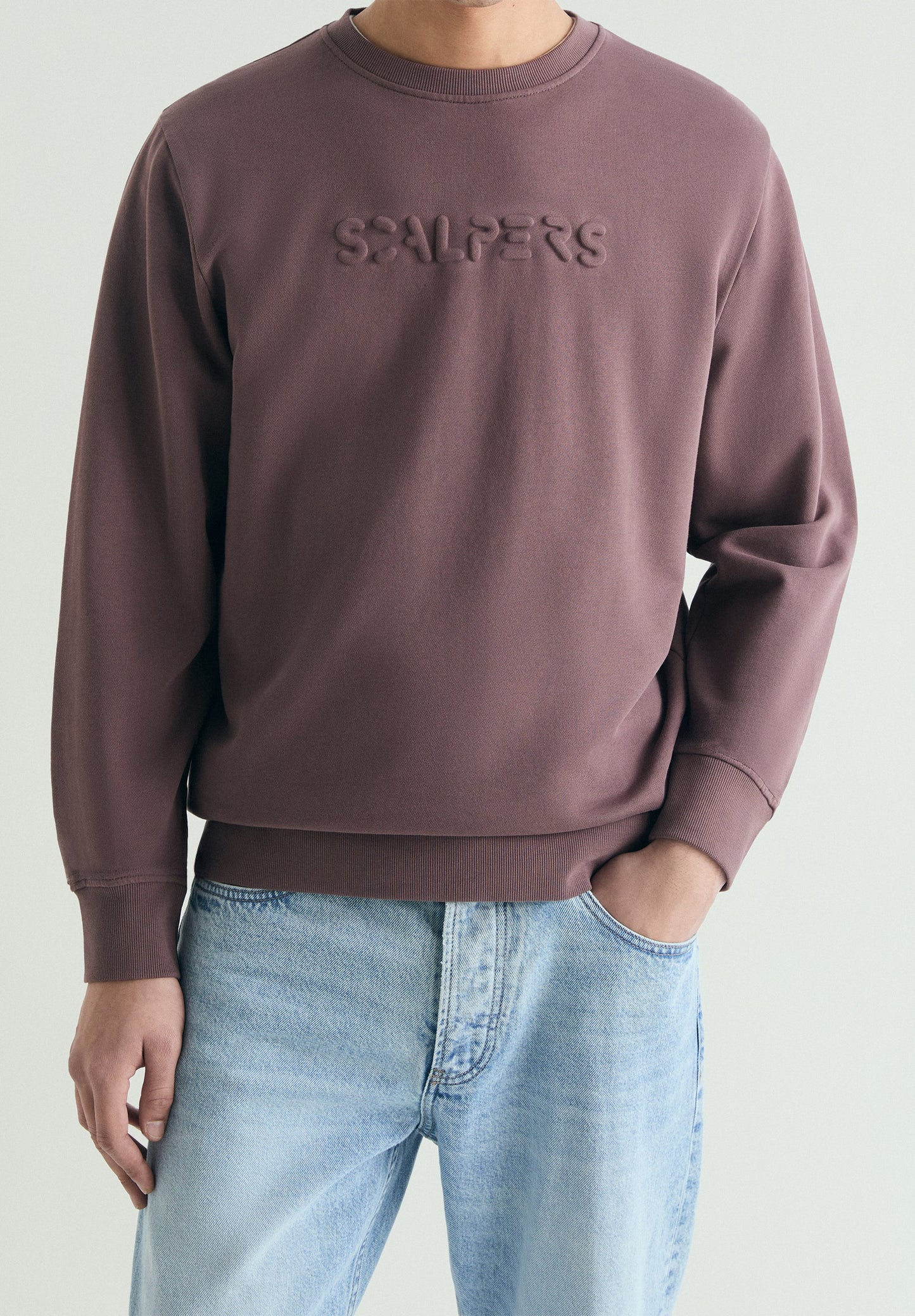 SWEATSHIRT WITH EMBOSSED SKULL