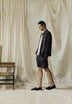 LINEN BERMUDA SHORTS WITH VISIBLE SEAMS