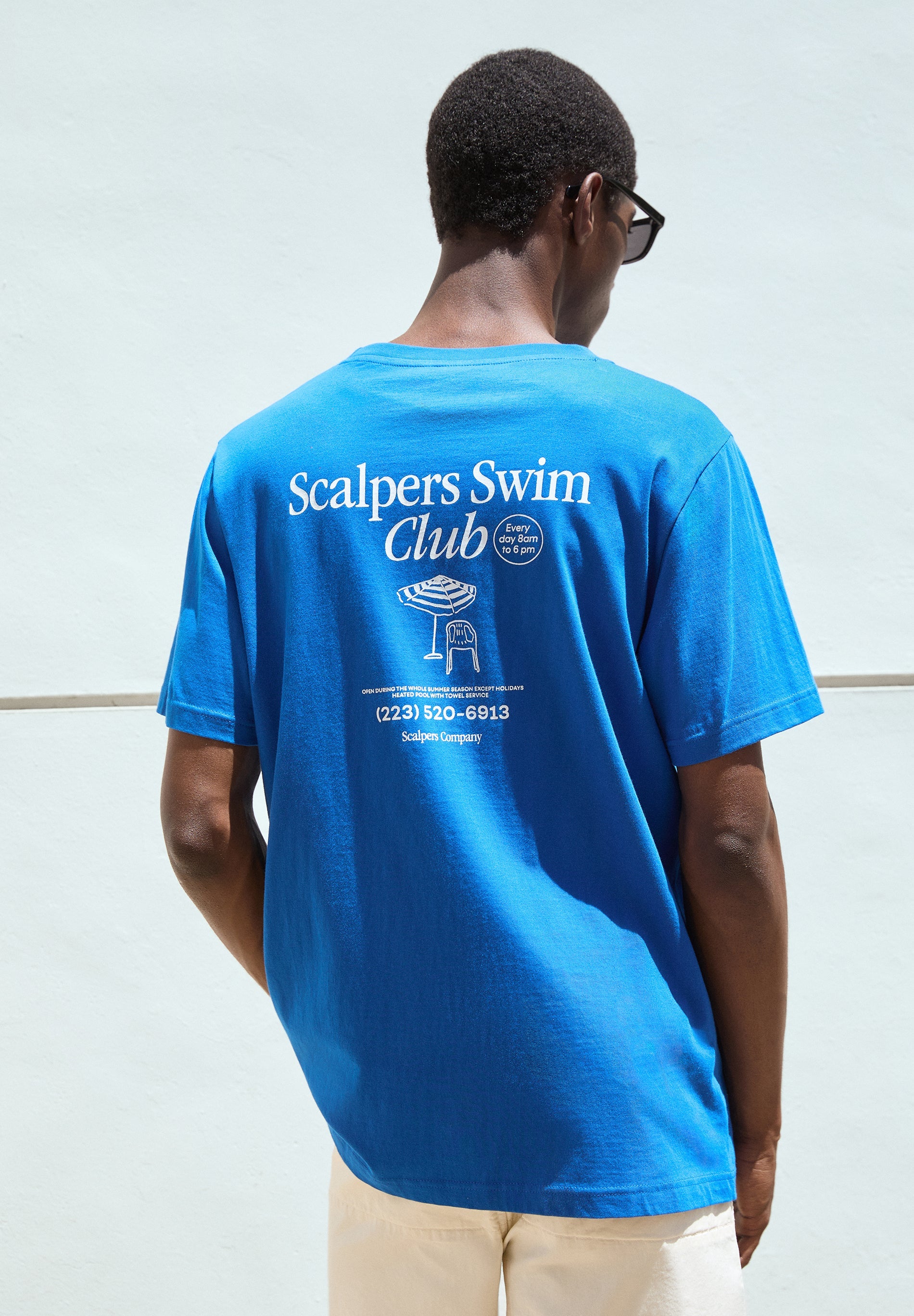 T-SHIRT WITH CLUB PRINT ON THE BACK