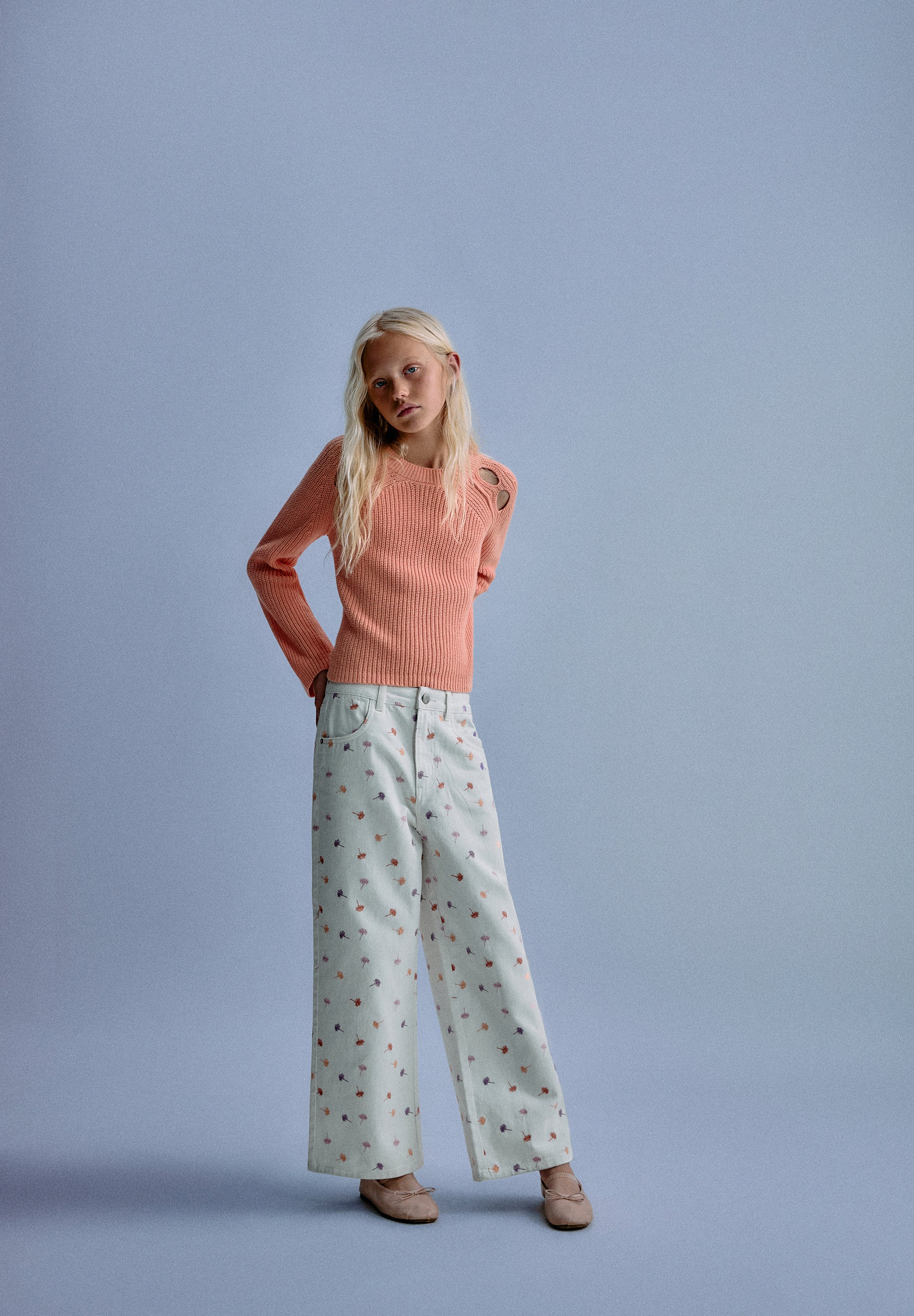 RIBBED KNIT SWEATER WITH OPENINGS