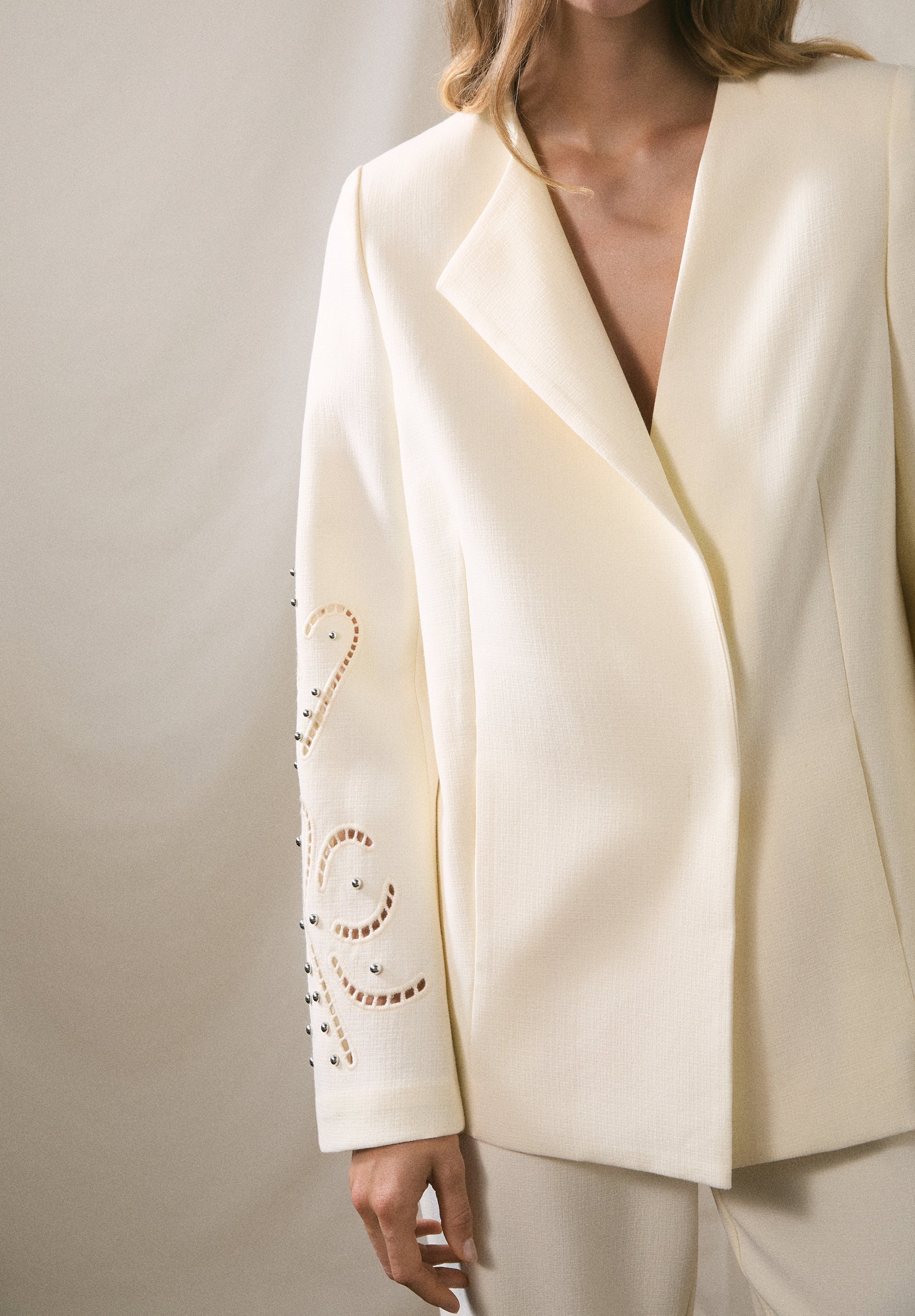 BLAZER WITH PERFORATED DETAILS
